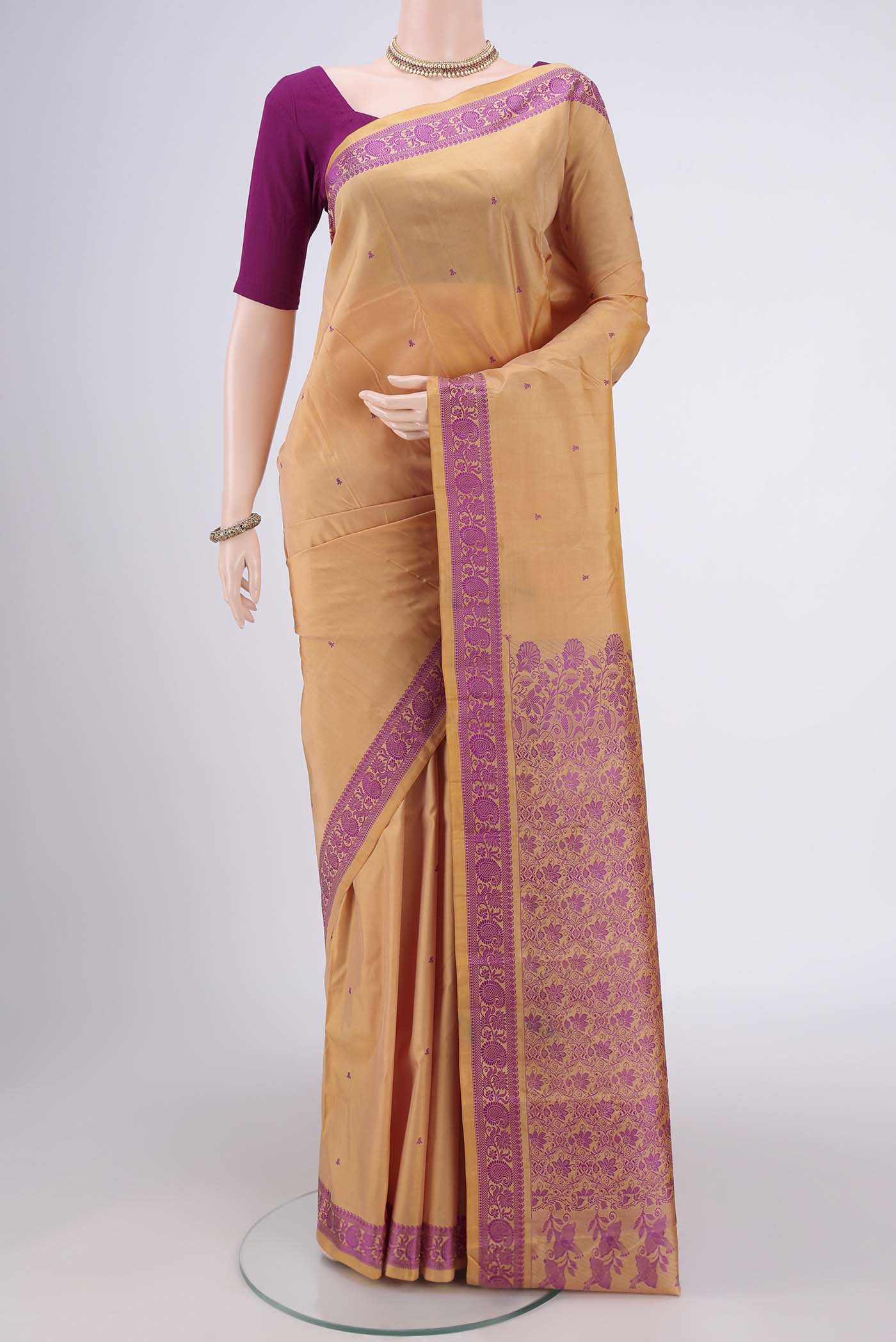 Sandal Kanchipuram Silk Saree with Thread Butta on the body and Thread Border.  displayed on a mannequin
