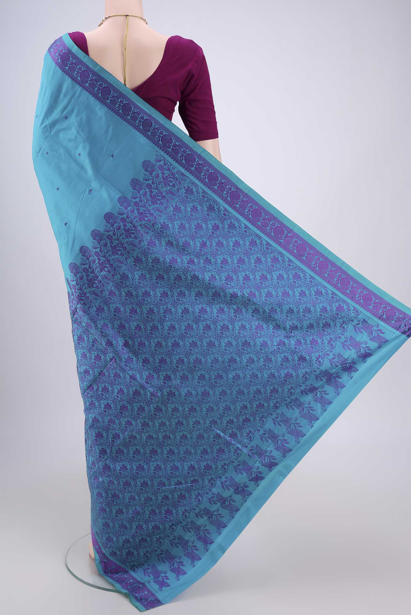 Flat view of Blue Kanchipuram Silk Saree with Thread Butta on the body and Thread Border. 
