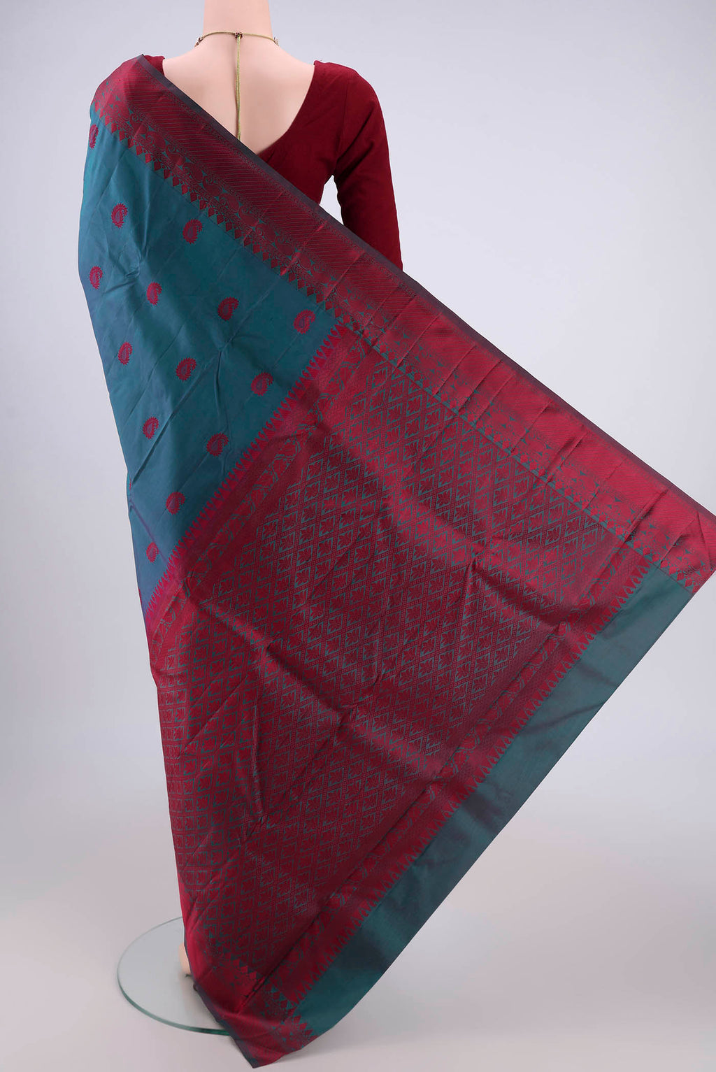 Flat view of Dark Blue Kanjivaram Silk Saree with Thread Butta on the body and Thread Border. 