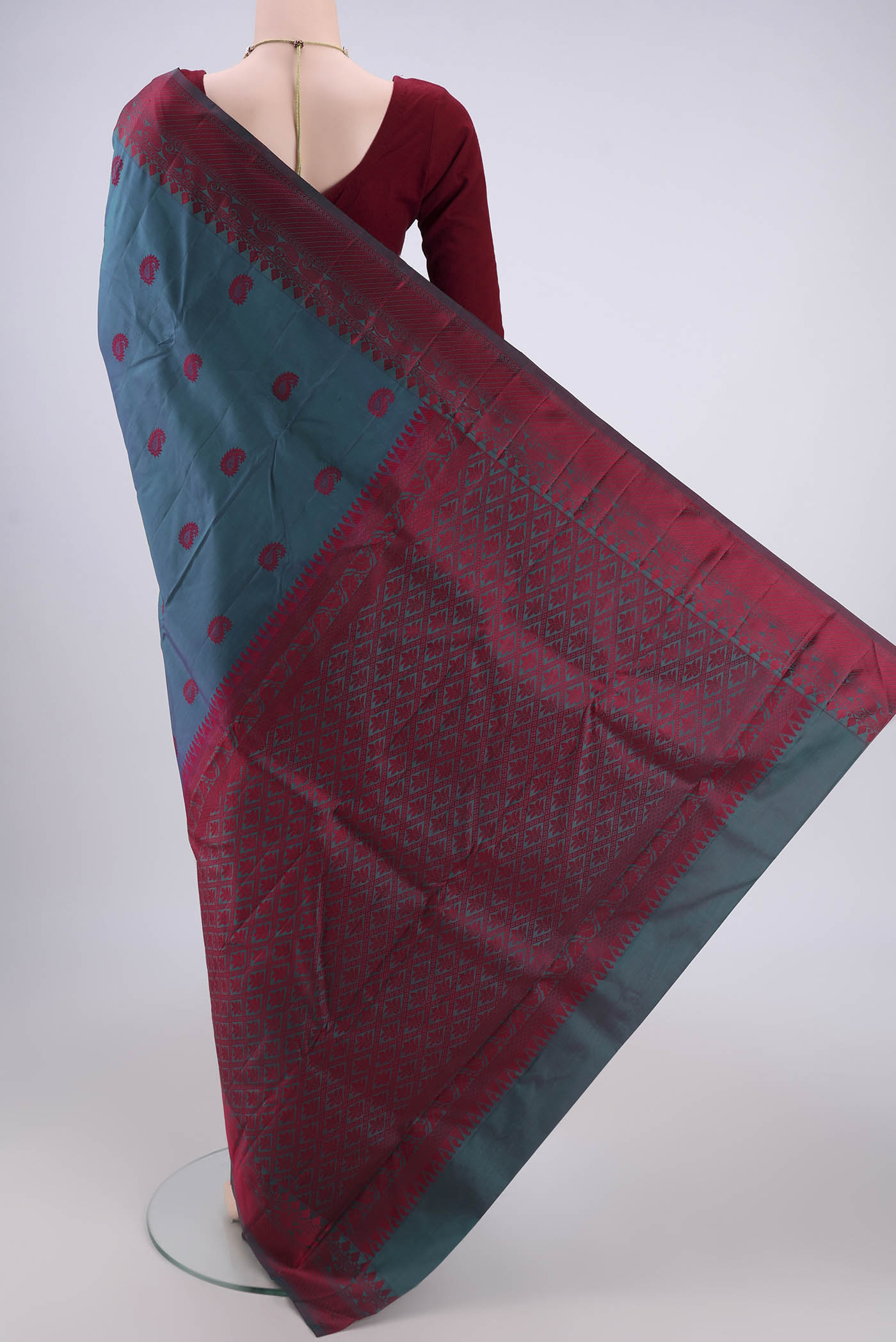 Flat view of Dark Blue Kanjivaram Silk Saree with Thread Butta on the body and Thread Border. 