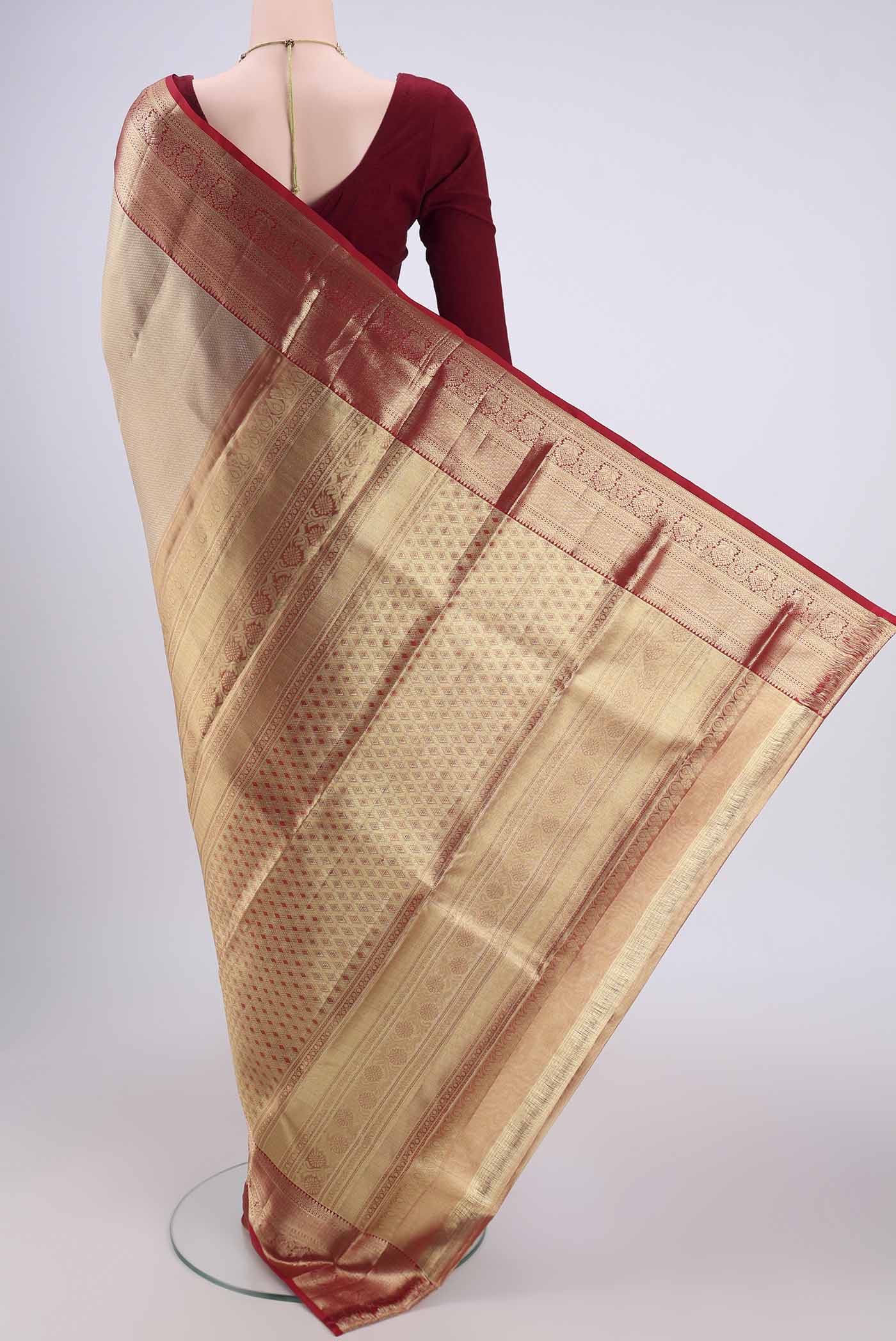 Flat view of Gold with maroom Dual Tone Kanjivaram Silk Saree with Zari Brocade on the body and Zari Border. 