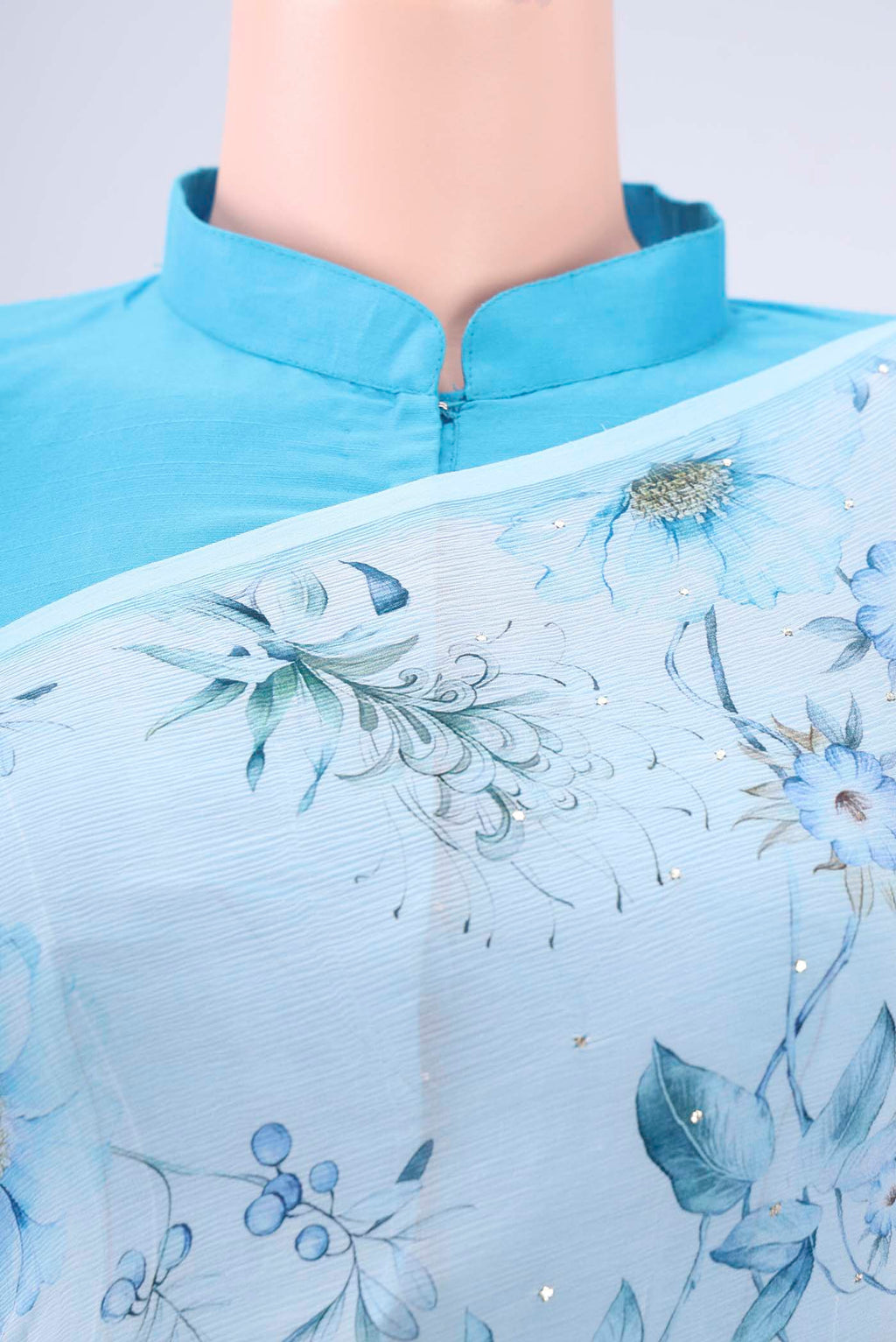 Border image of White Mysore Chiffon Saree with Floral Print on the body and Sequin Border. 