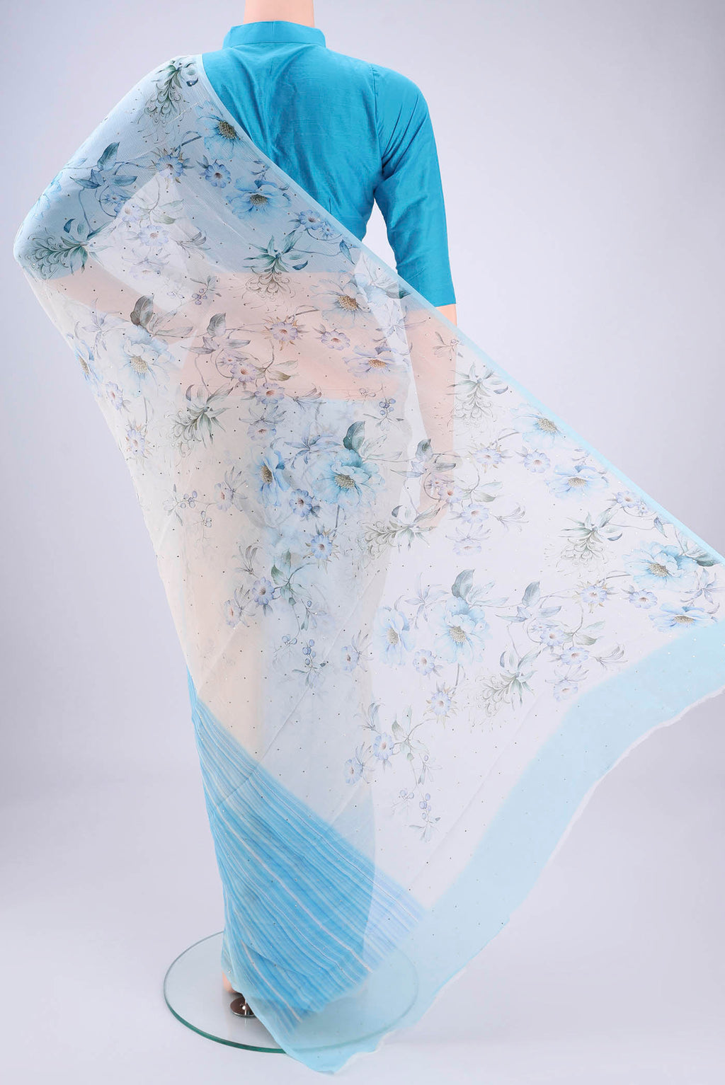 Flat view of White Mysore Chiffon Saree with Floral Print on the body and Sequin Border. 