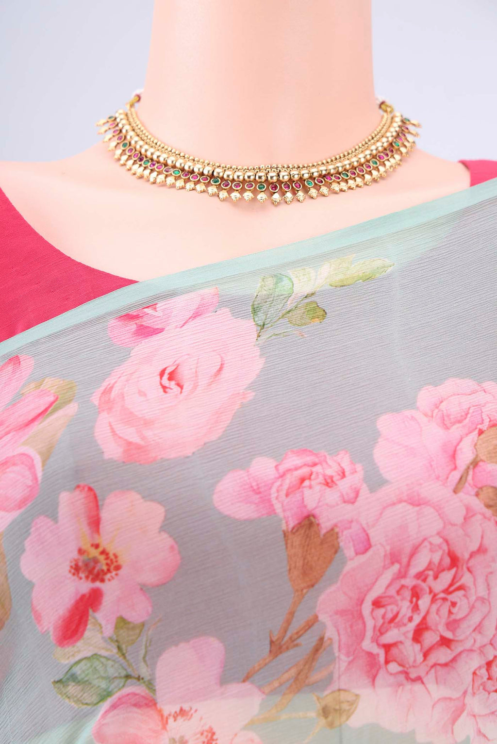 Border image of Sea Green Mysore Chiffon Saree with Floral Print on the body and Plain Border. 