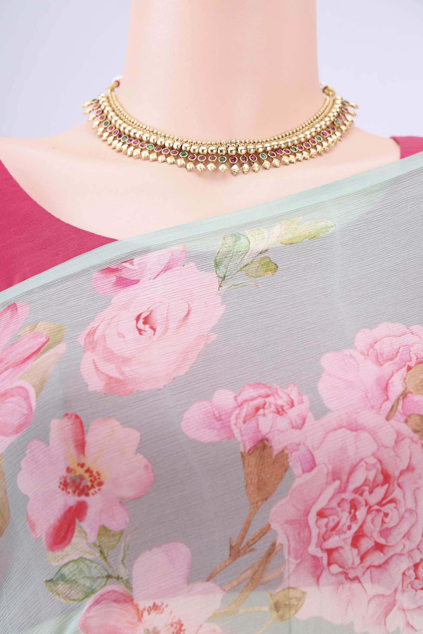 Border image of Sea Green Mysore Chiffon Saree with Floral Print on the body and Plain Border. 
