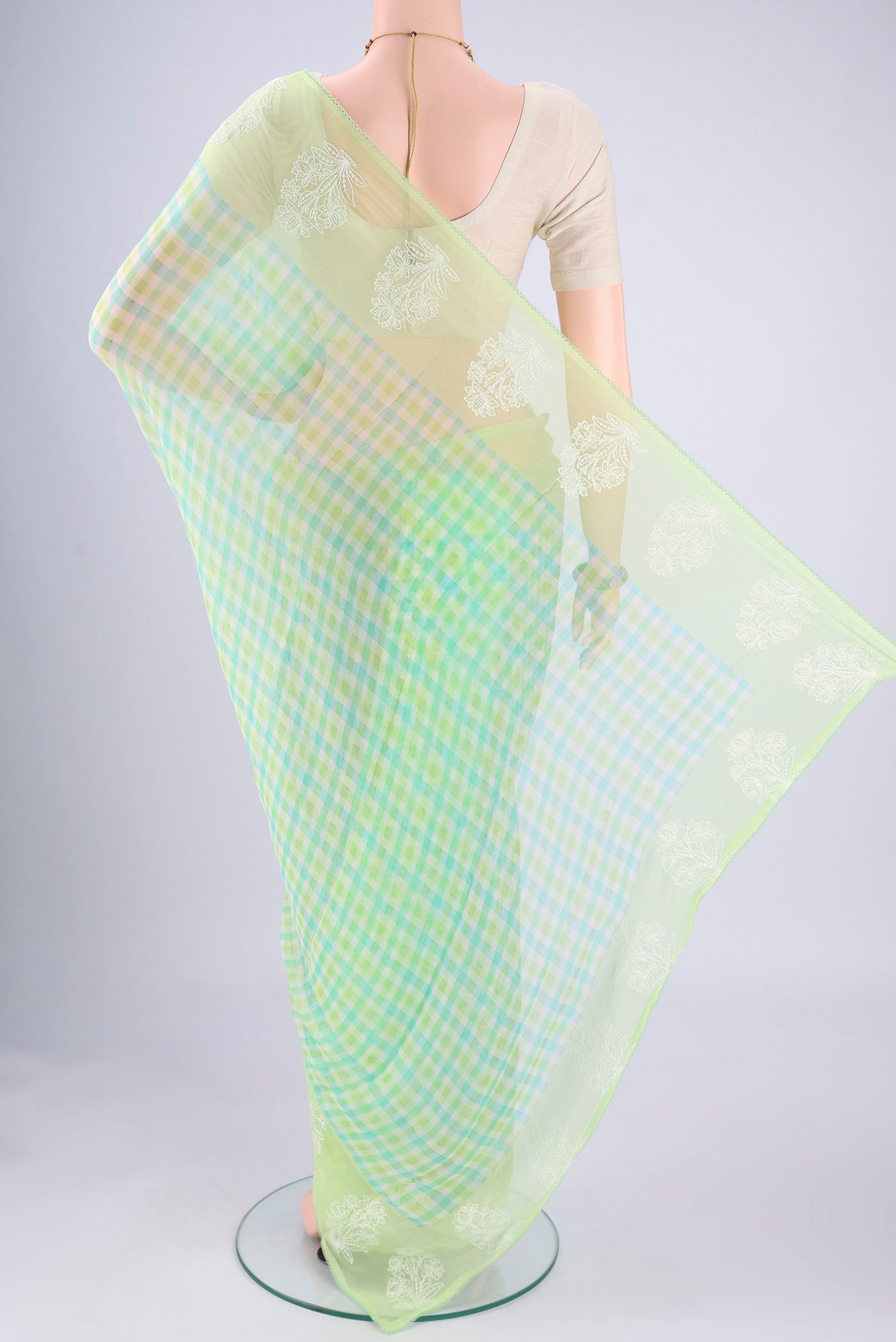 Flat view of Light Green Mysore Chiffon Saree with Checked design on the body and Thread Border. 