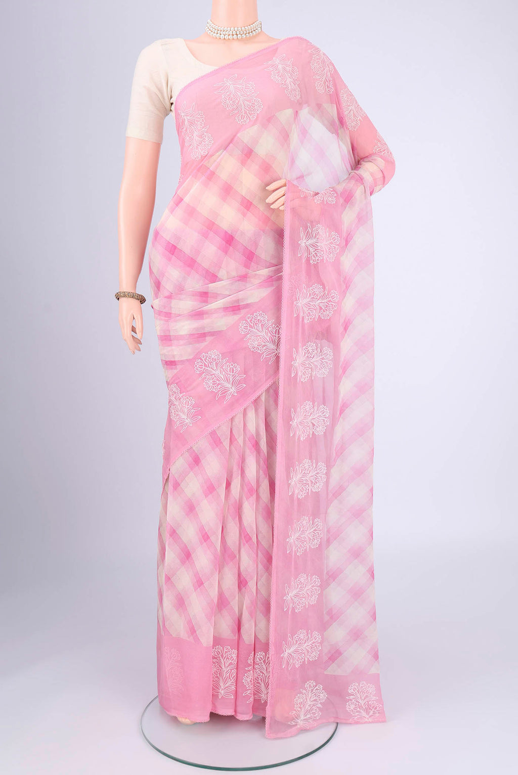 Rose pink Mysore Chiffon Saree with Checked design on the body and Thread Border.  displayed on a mannequin