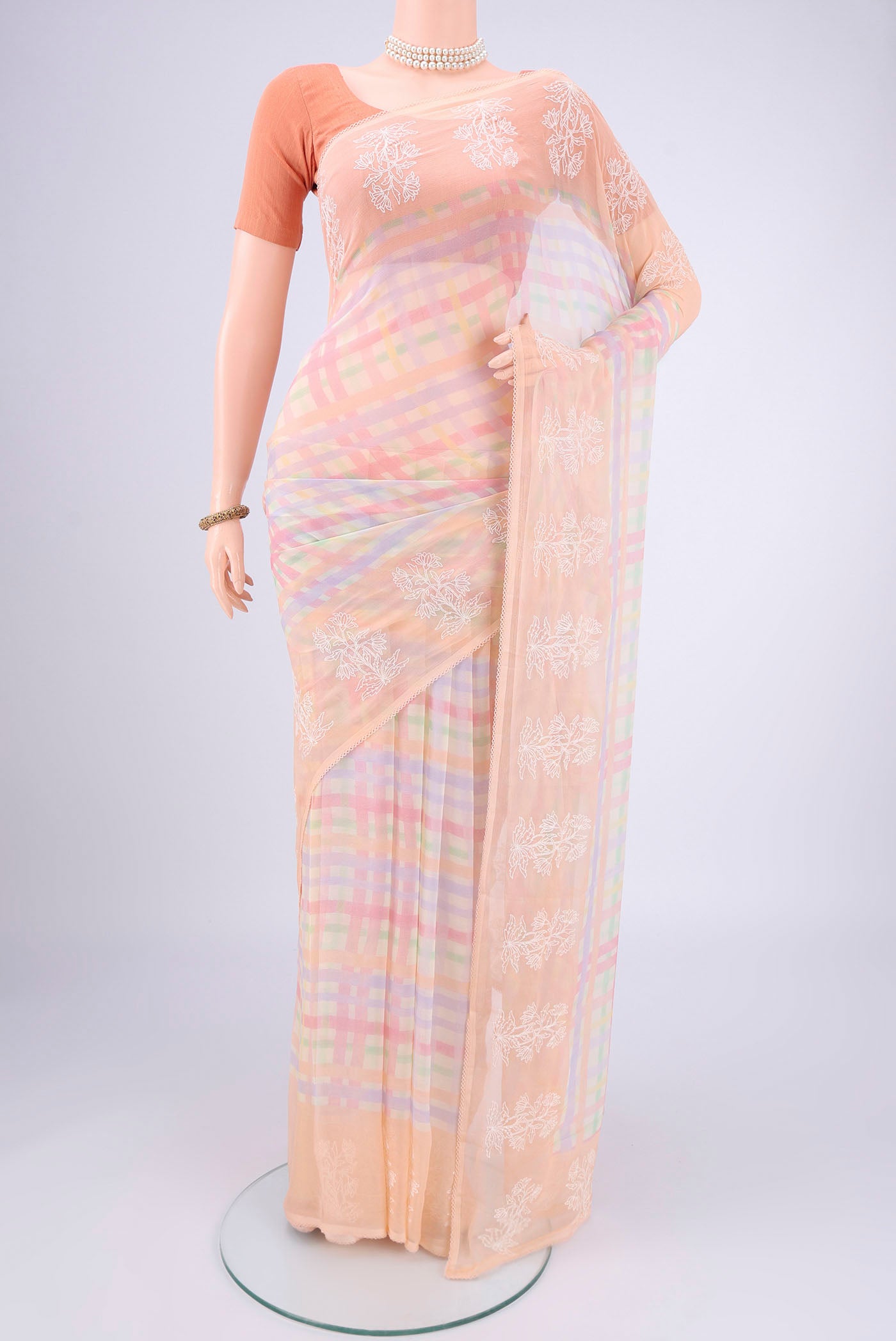 Multi Color Mysore Chiffon Saree with Checked design on the body and Thread Border.  displayed on a mannequin