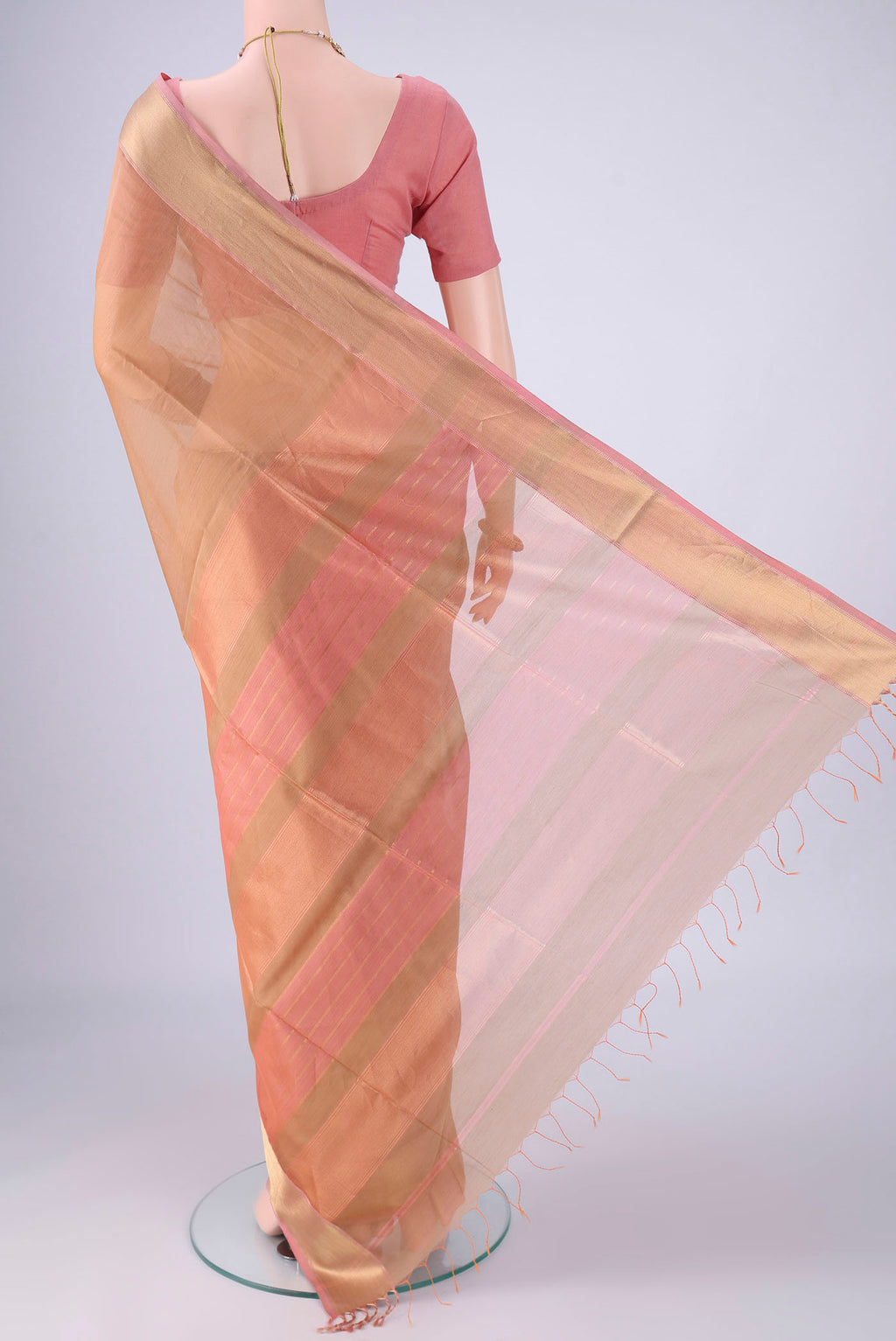Flat view of Dark Beige Maheshwari Silk Cotton Saree with Plain Body and Zari Border. 