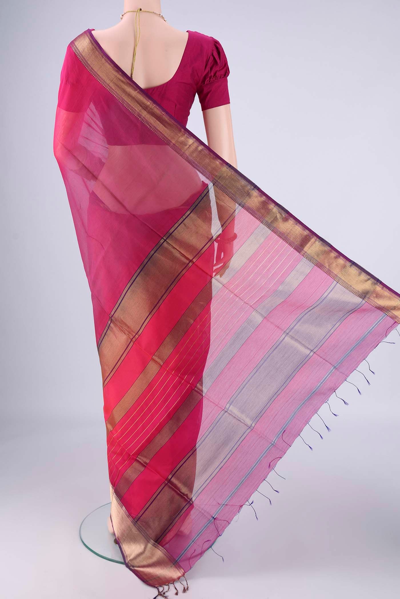 Flat view of Multi Color Maheshwari Silk Cotton Saree with Plain Body and Zari Border. 