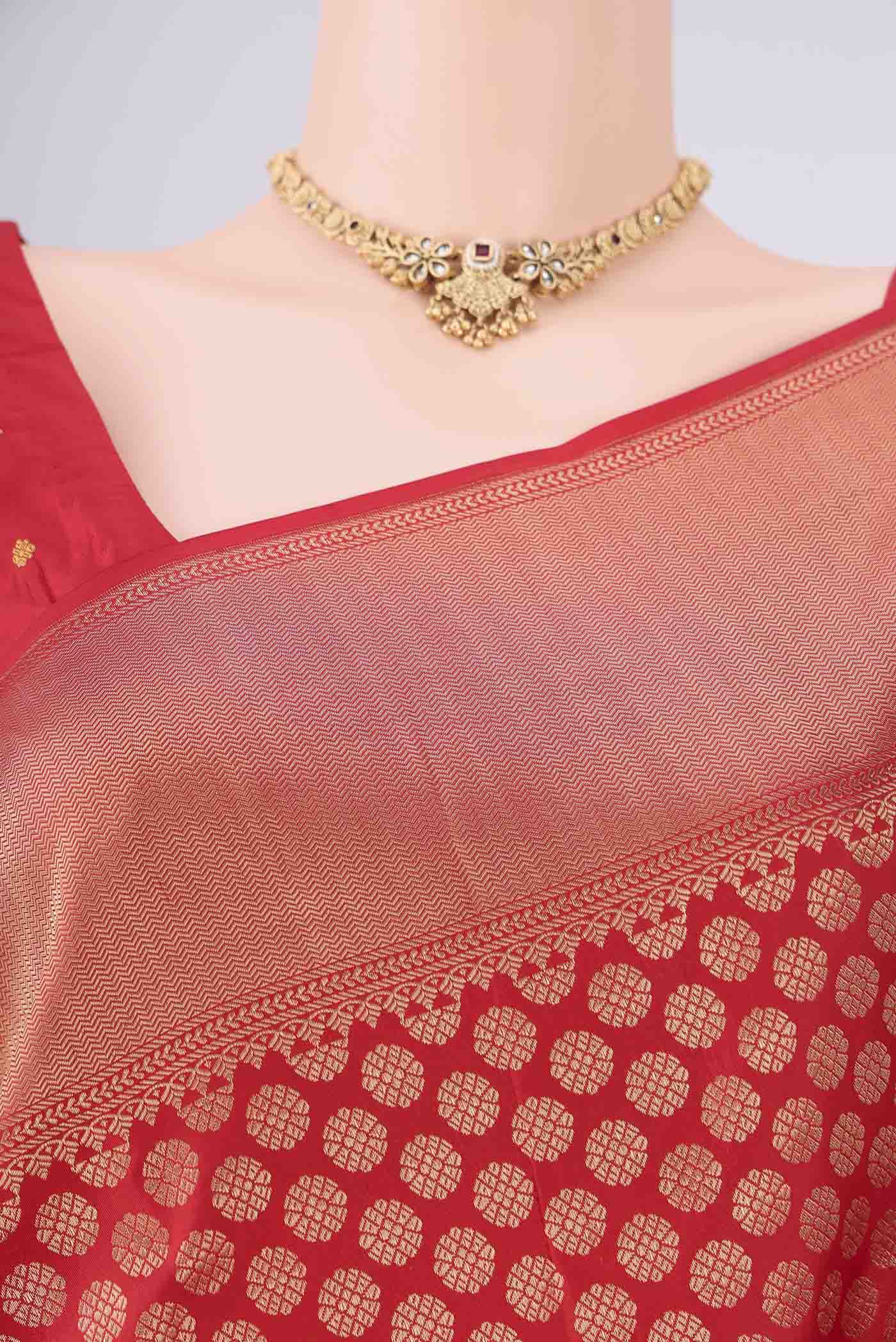 Border image of Red Soft Silk Saree with Zari Brocade on the body and Zari Border. 