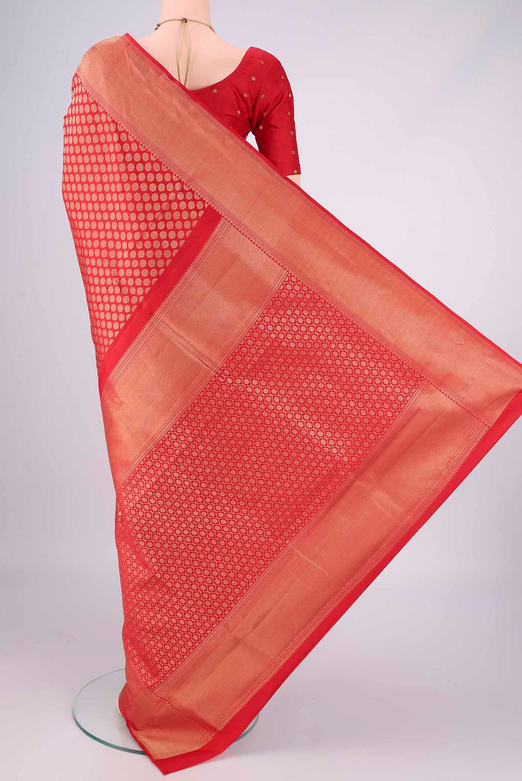Flat view of Red Soft Silk Saree with Zari Brocade on the body and Zari Border. 