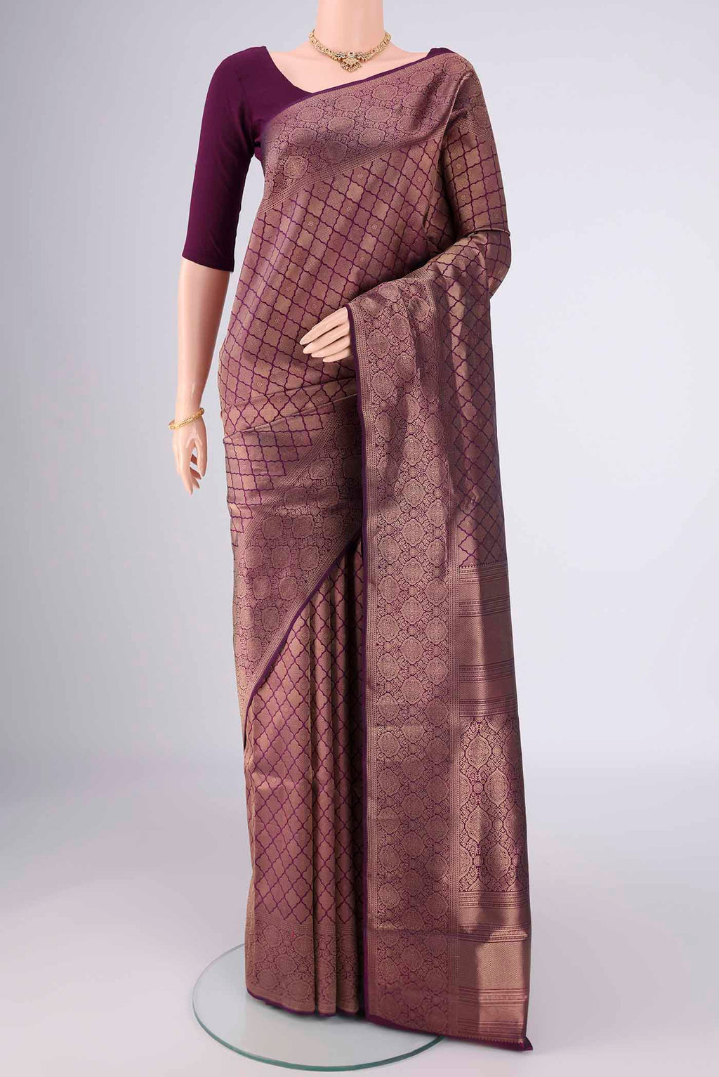 Purple Soft Silk Saree with Zari Brocade on the body and Zari Border.  displayed on a mannequin