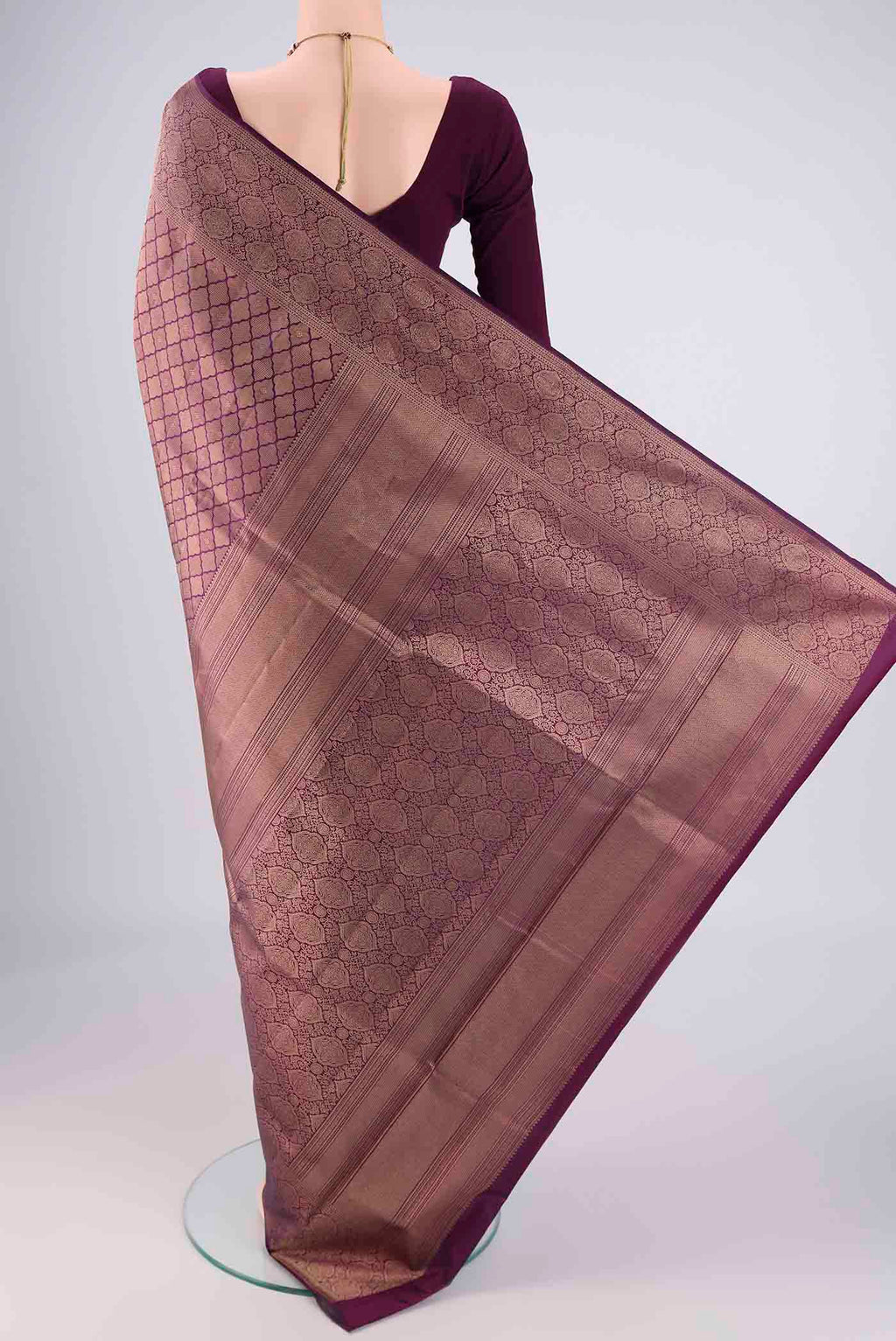 Flat view of Purple Soft Silk Saree with Zari Brocade on the body and Zari Border. 