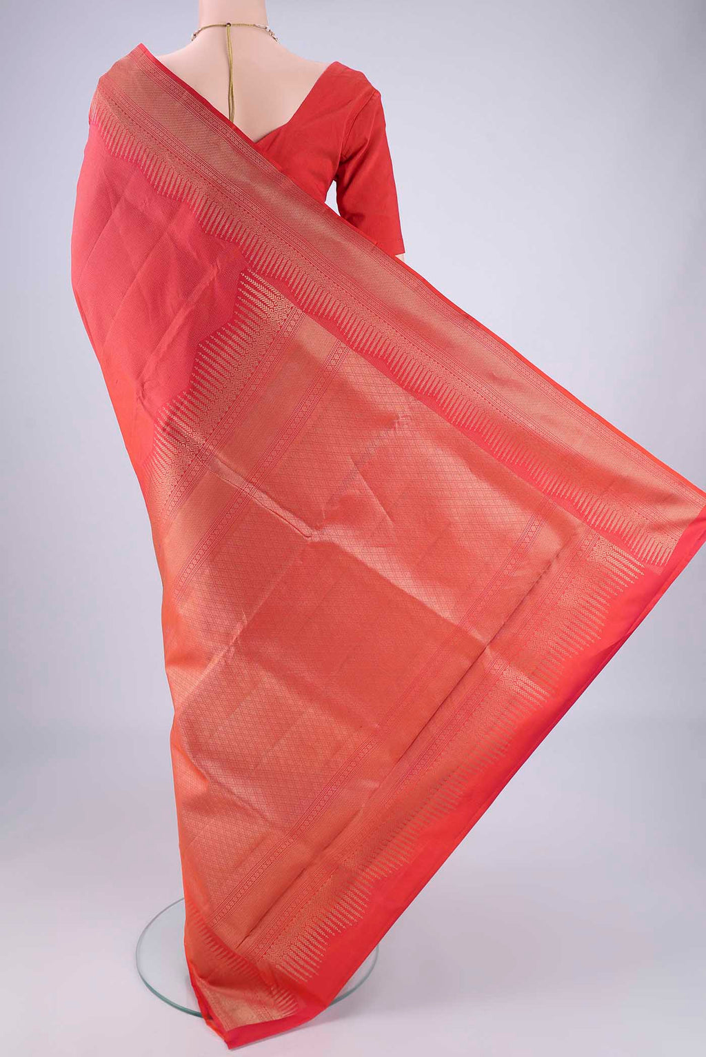 Flat view of Brick Orange Dual Tone Soft Silk Saree with Zari Brocade on the body and Zari Border. 