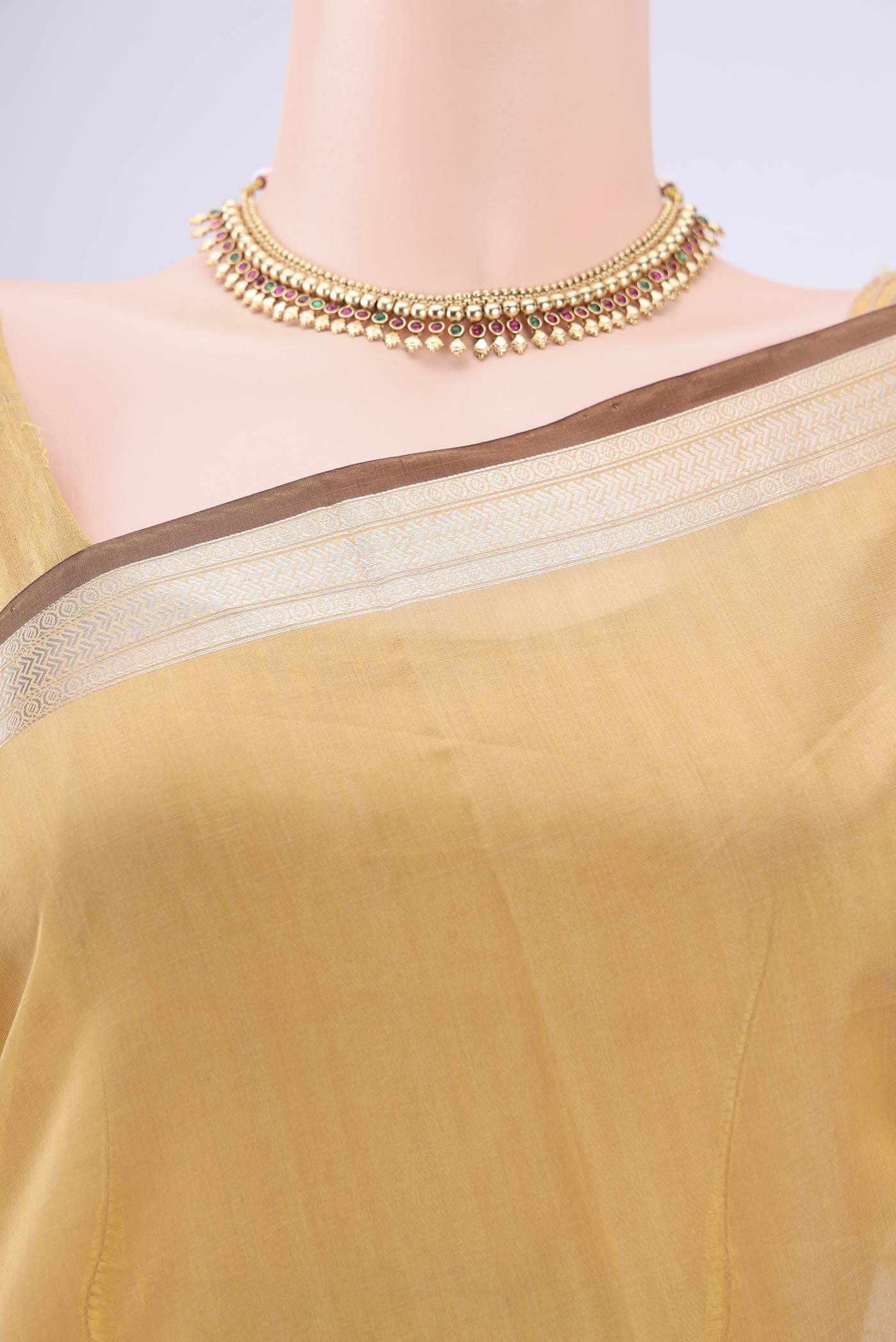 Border image of Dark Beige Chanderi Silk Cotton Saree with Zari Butta on the body and Zari Border. 