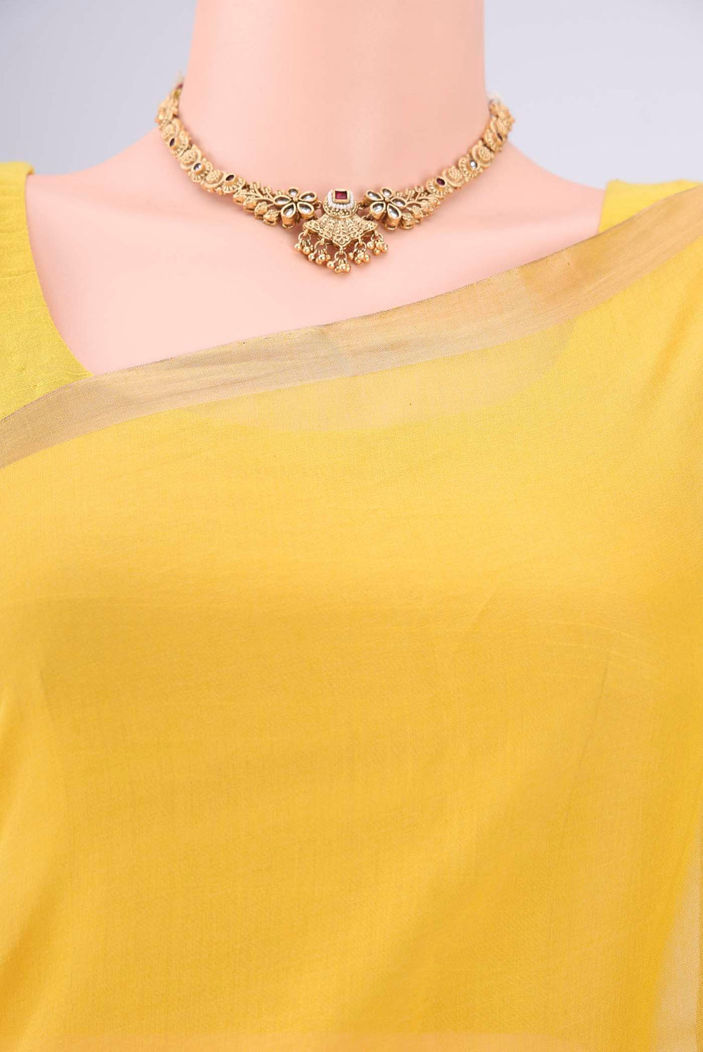 Border image of Lemon Yellow Chanderi Silk Cotton Saree with Zari Butta on the body and Zari Border. 