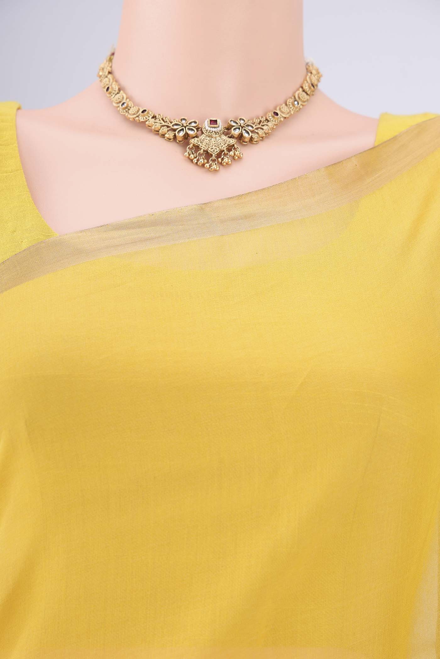 Border image of Lemon Yellow Chanderi Silk Cotton Saree with Zari Butta on the body and Zari Border. 