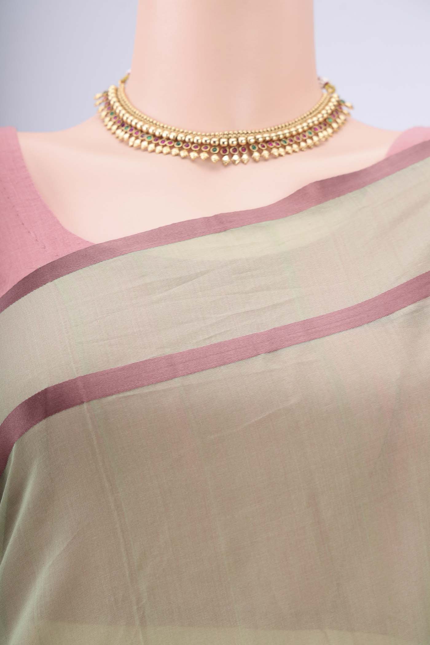 Border image of Sage Green Chanderi Silk Cotton Saree with Zari Butta on the body and Thread Border. 