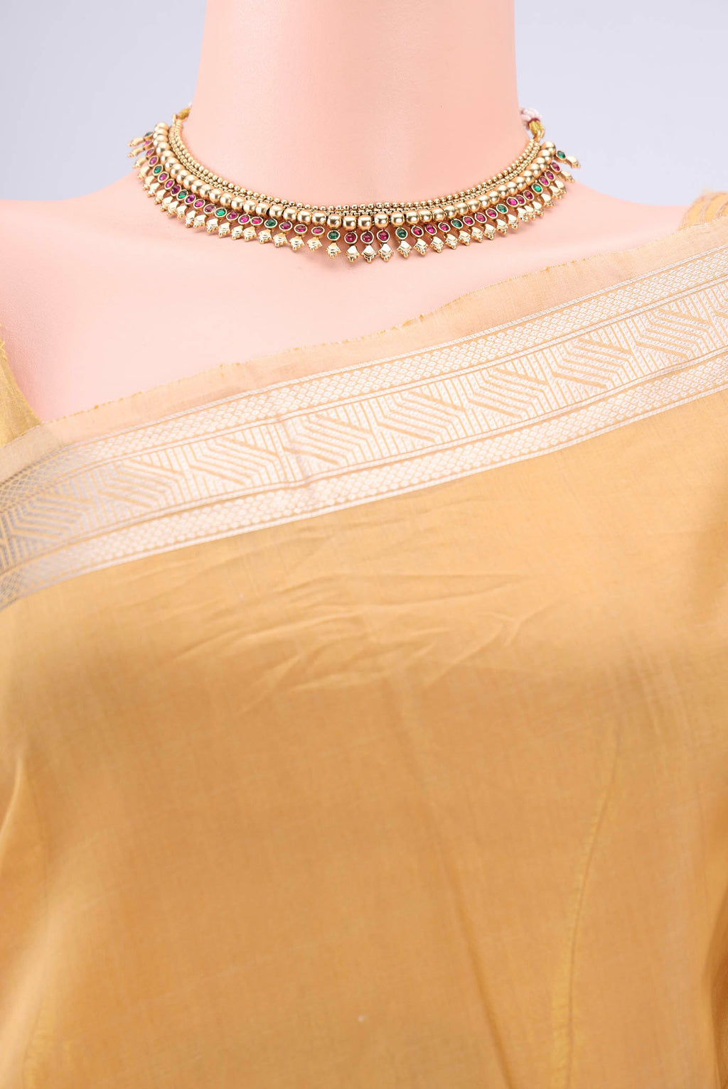 Border image of Dark Beige Chanderi Silk Cotton Saree with Zari Butta on the body and Zari Border. 
