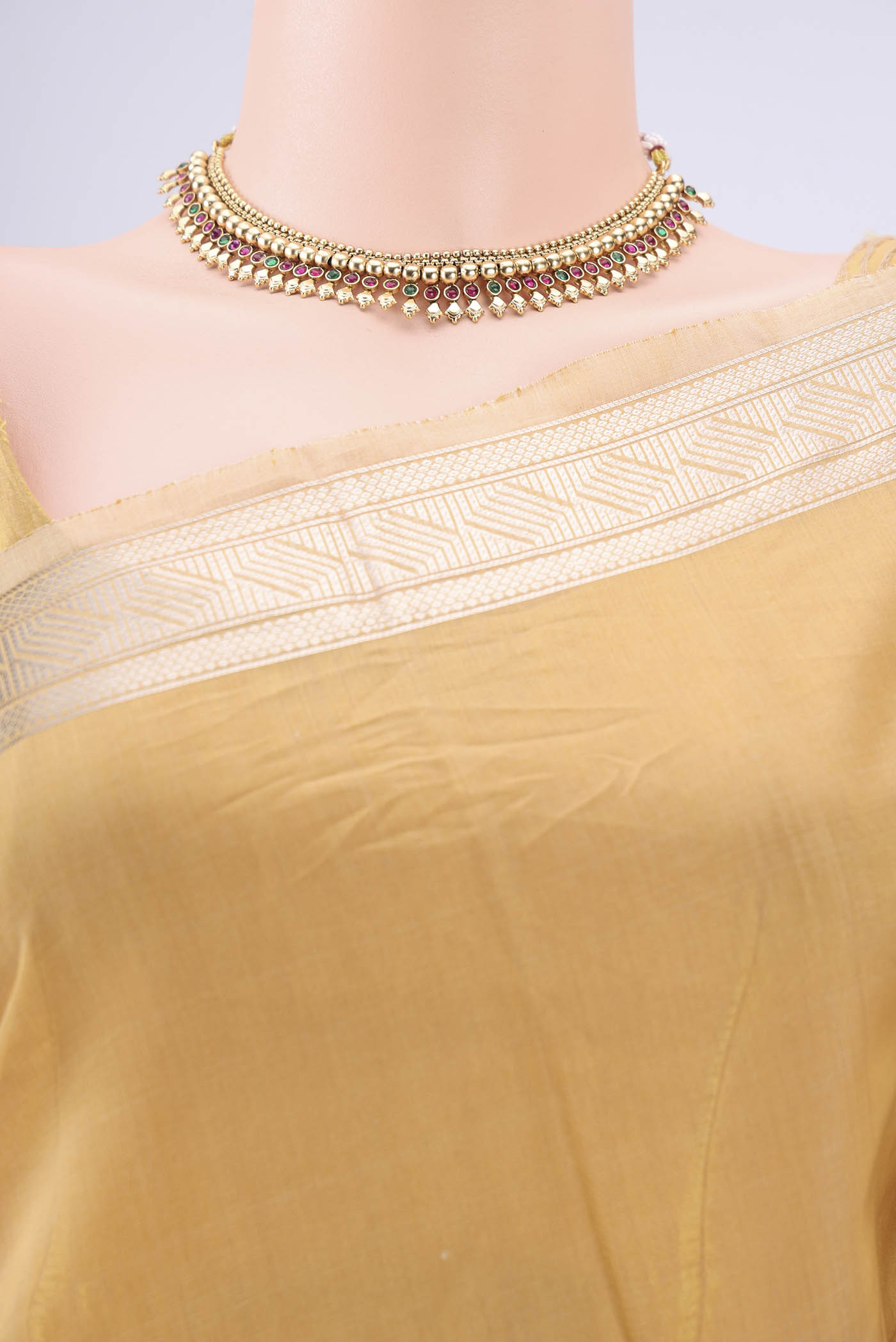 Border image of Dark Beige Chanderi Silk Cotton Saree with Zari Butta on the body and Zari Border. 