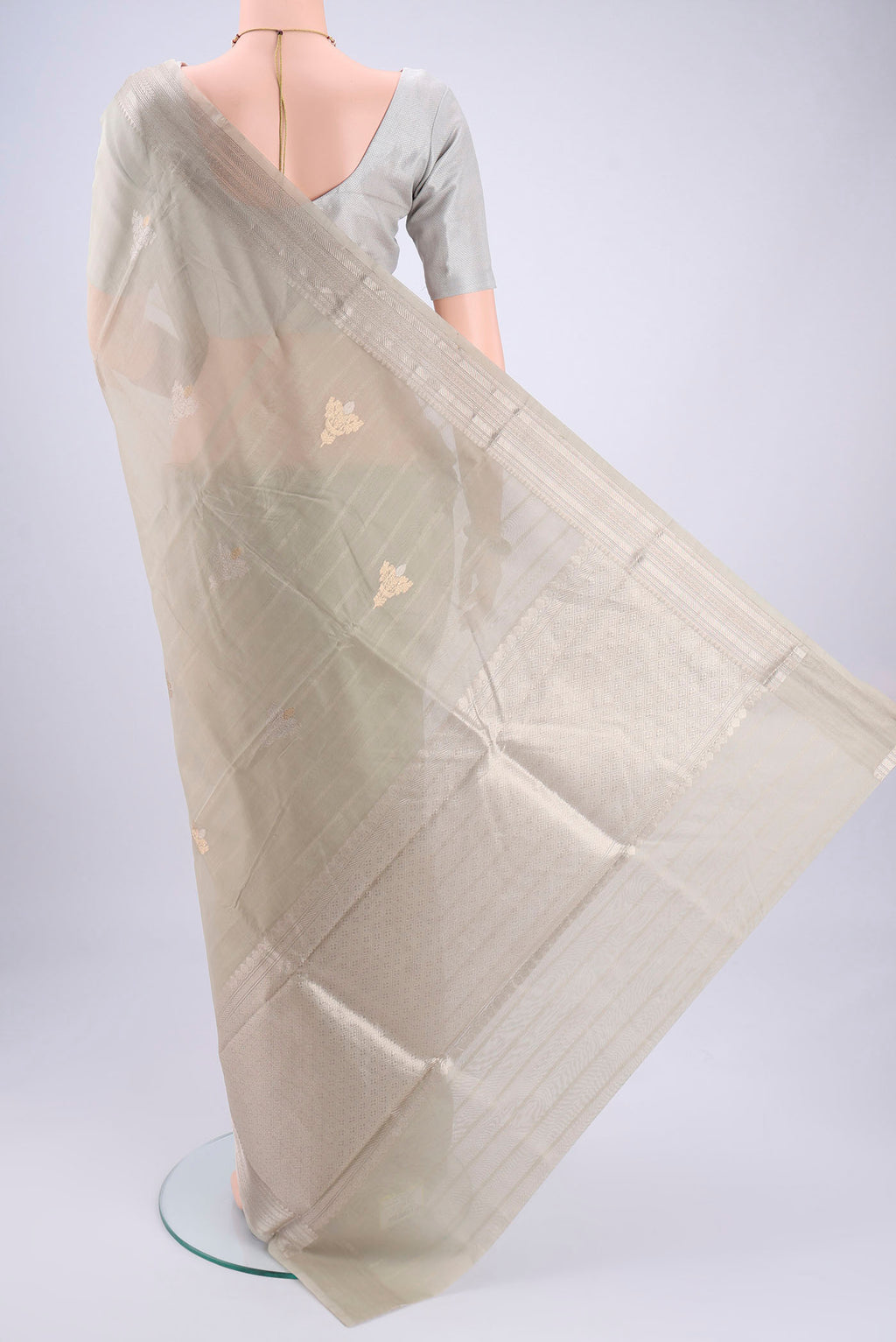Flat view of Davys Grey Chanderi Silk Cotton Saree with Zari Butta on the body and Zari Border. 