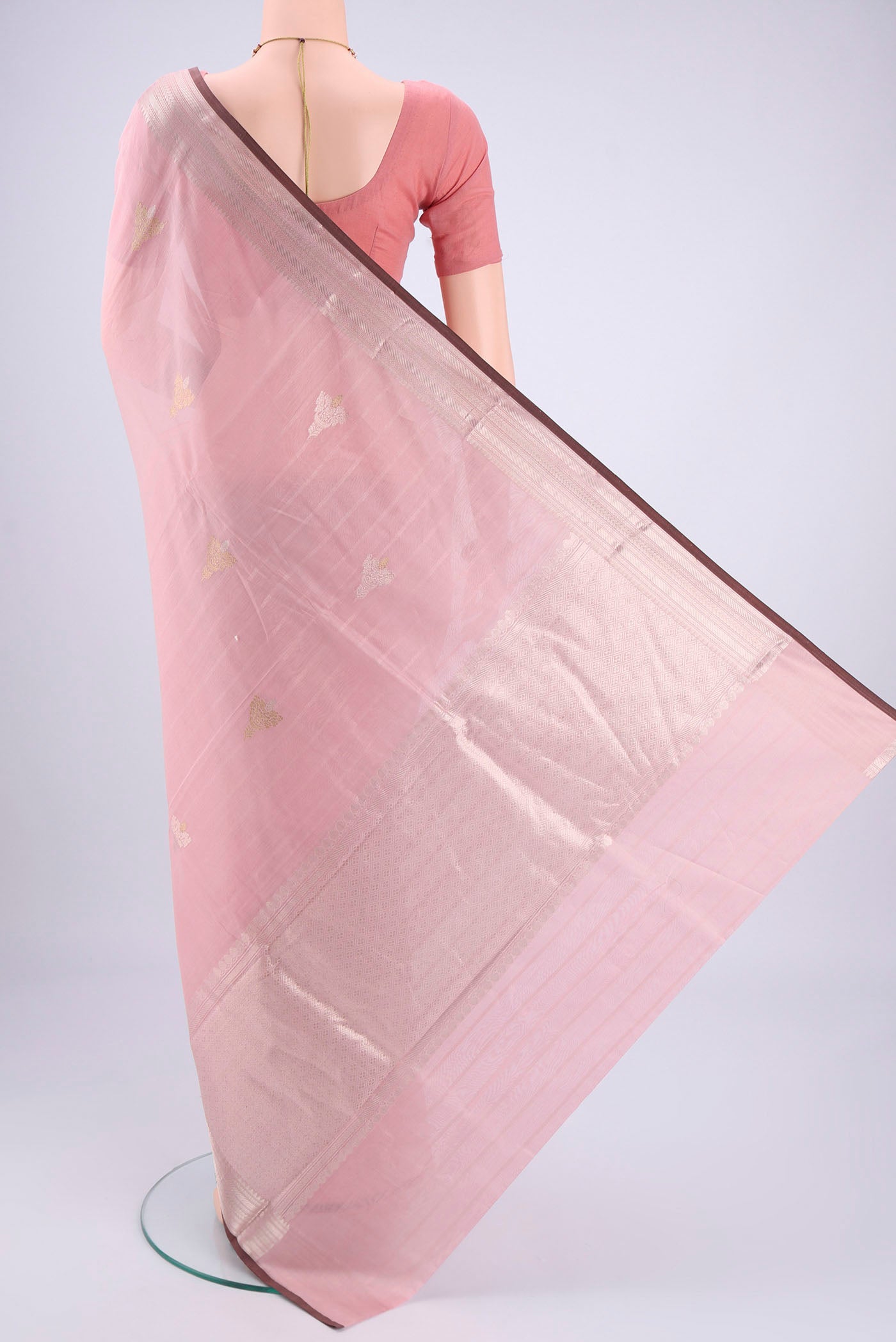 Flat view of Rose pink Chanderi Silk Cotton Saree with Zari Butta on the body and Zari Border. 