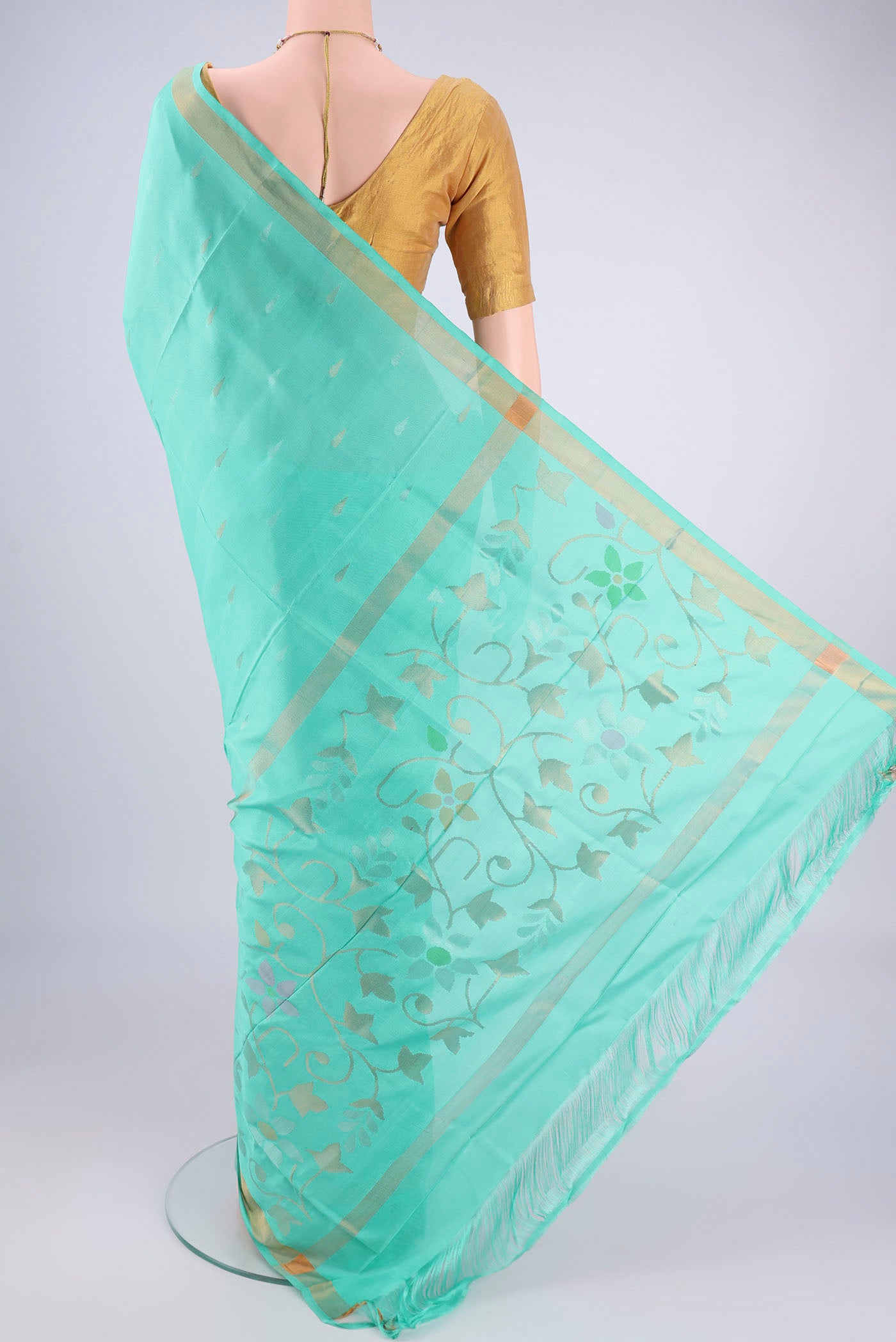 Flat view of Turquoise Uppada Silk Saree with Zari Butta on the body and Zari Border. 