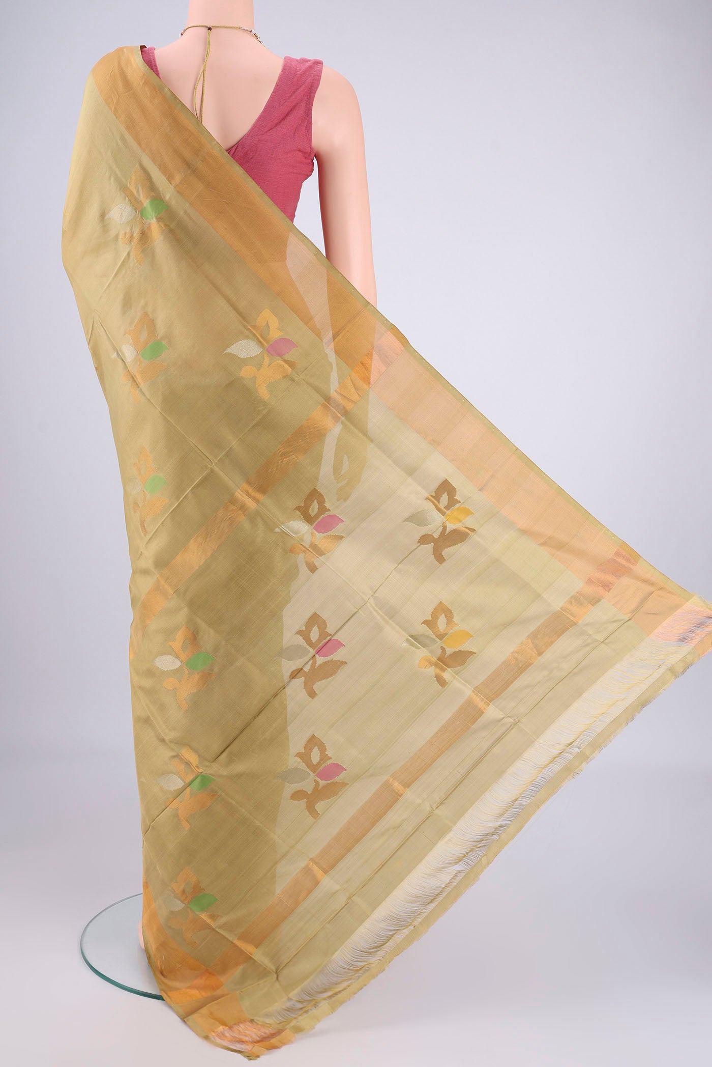 Flat view of Beige Uppada Silk Saree with Zari And Thread Butta on the body and Zari Border. 