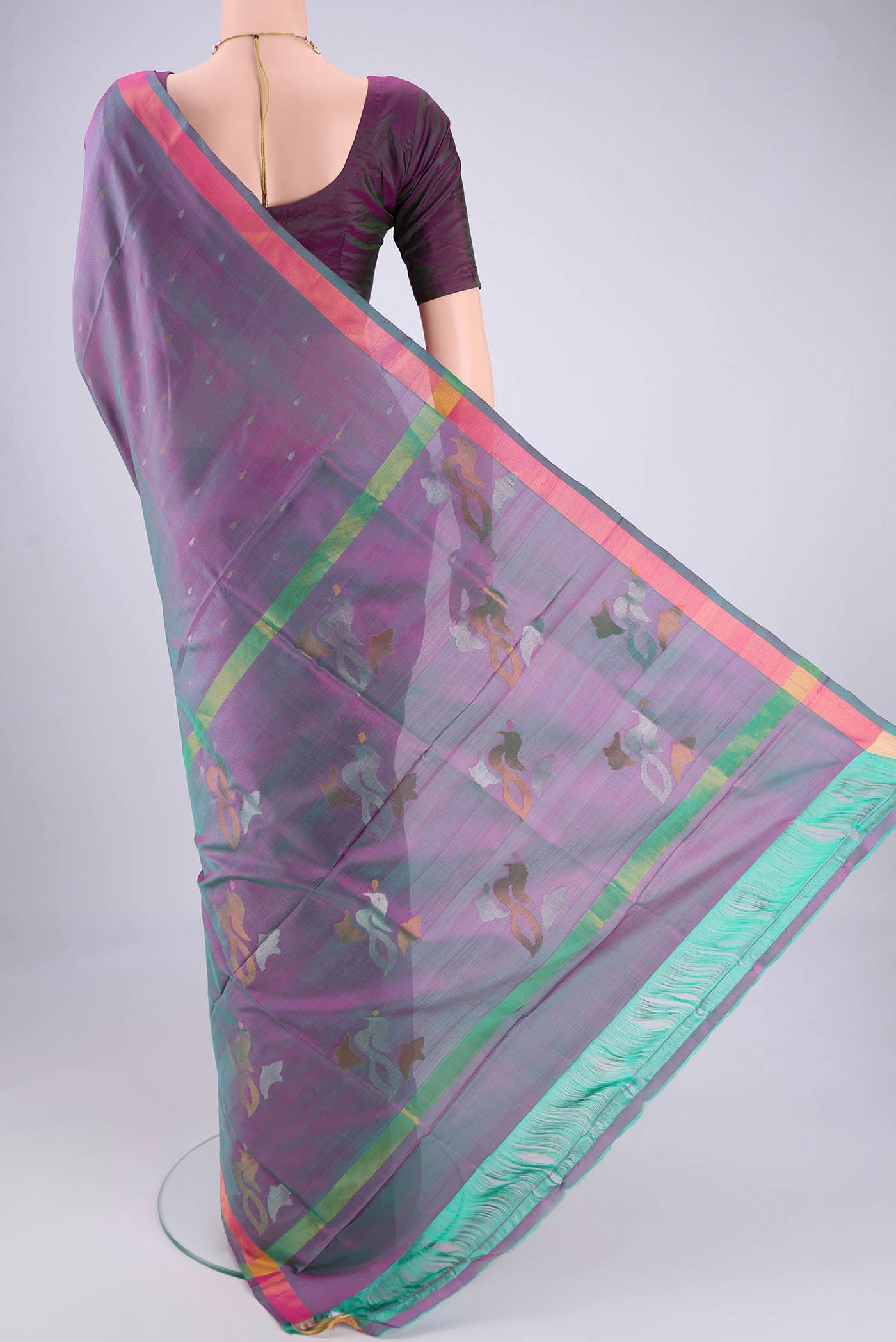 Flat view of Lavender Dual Tone Uppada Silk Saree with Zari Butta on the body and Zari Border. 