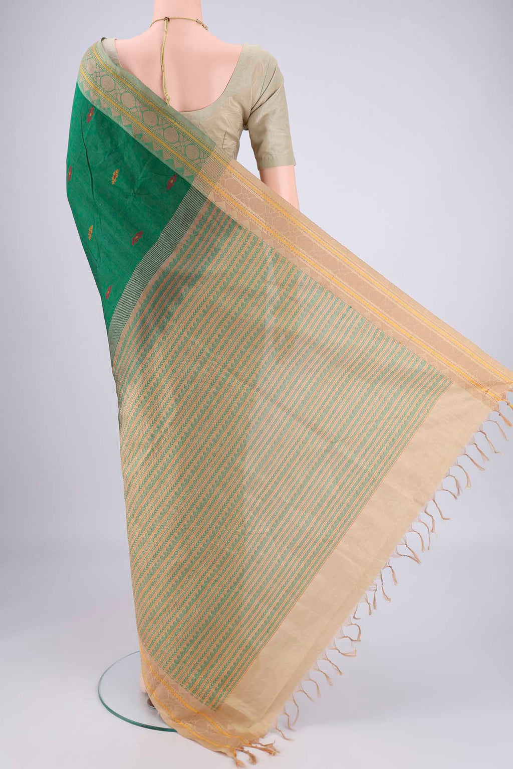 Flat view of Bottle Green Blended Poly Cotton Saree with Thread Butta on the body and Thread Border. 