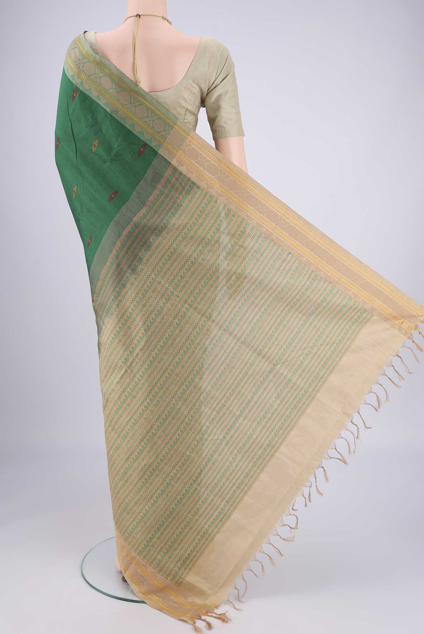 Flat view of Bottle Green Blended Poly Cotton Saree with Thread Butta on the body and Thread Border. 