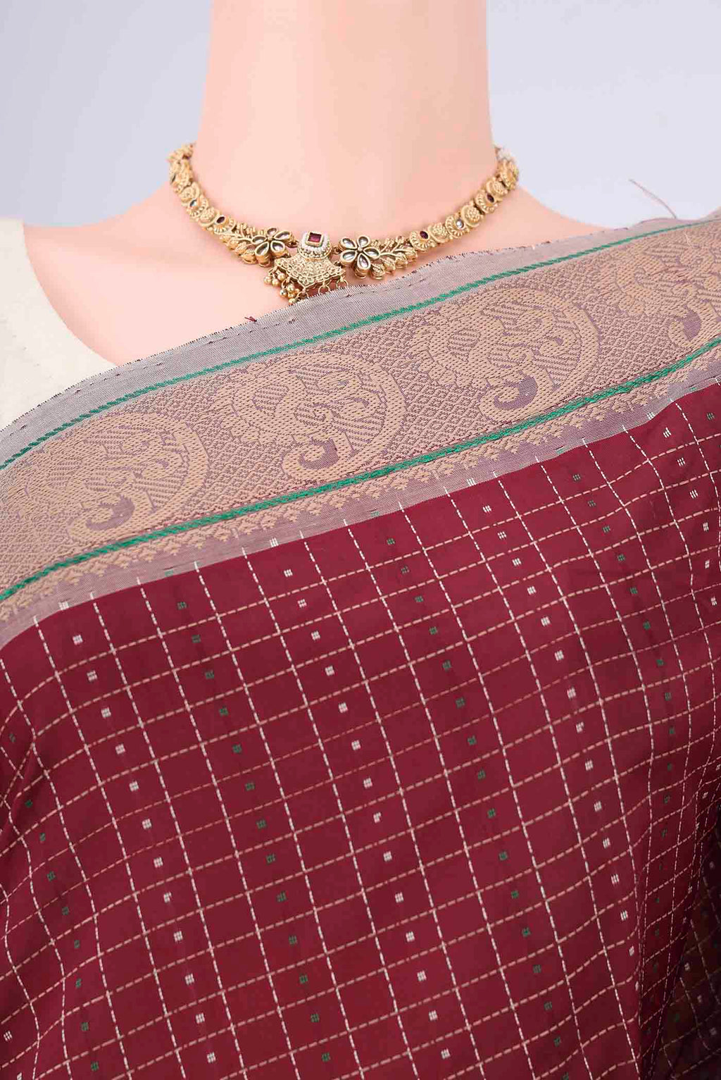 Border image of Maroon Blended Poly Cotton Saree with Checked design on the body and Thread Border. 