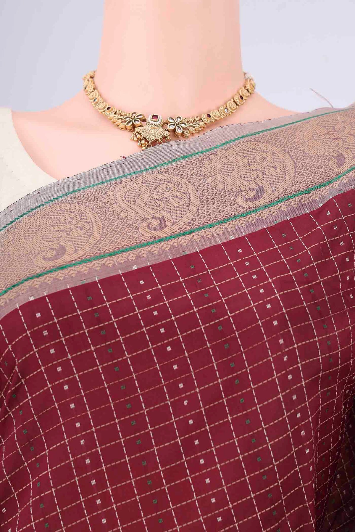 Border image of Maroon Blended Poly Cotton Saree with Checked design on the body and Thread Border. 