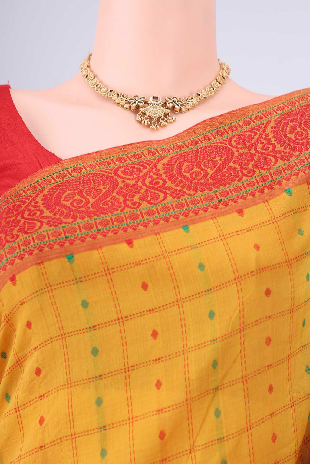 Border image of Yellow Blended Poly Cotton Saree with Checked design on the body and Thread Border. 