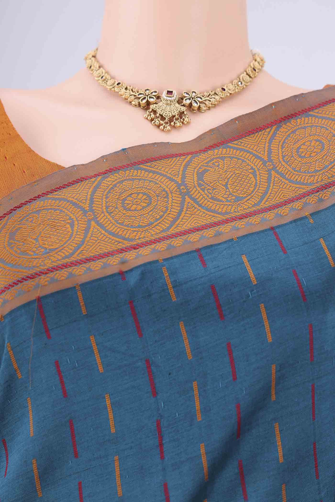 Border image of Blue Blended Poly Cotton Saree with Stripes on the body and Thread Border. 