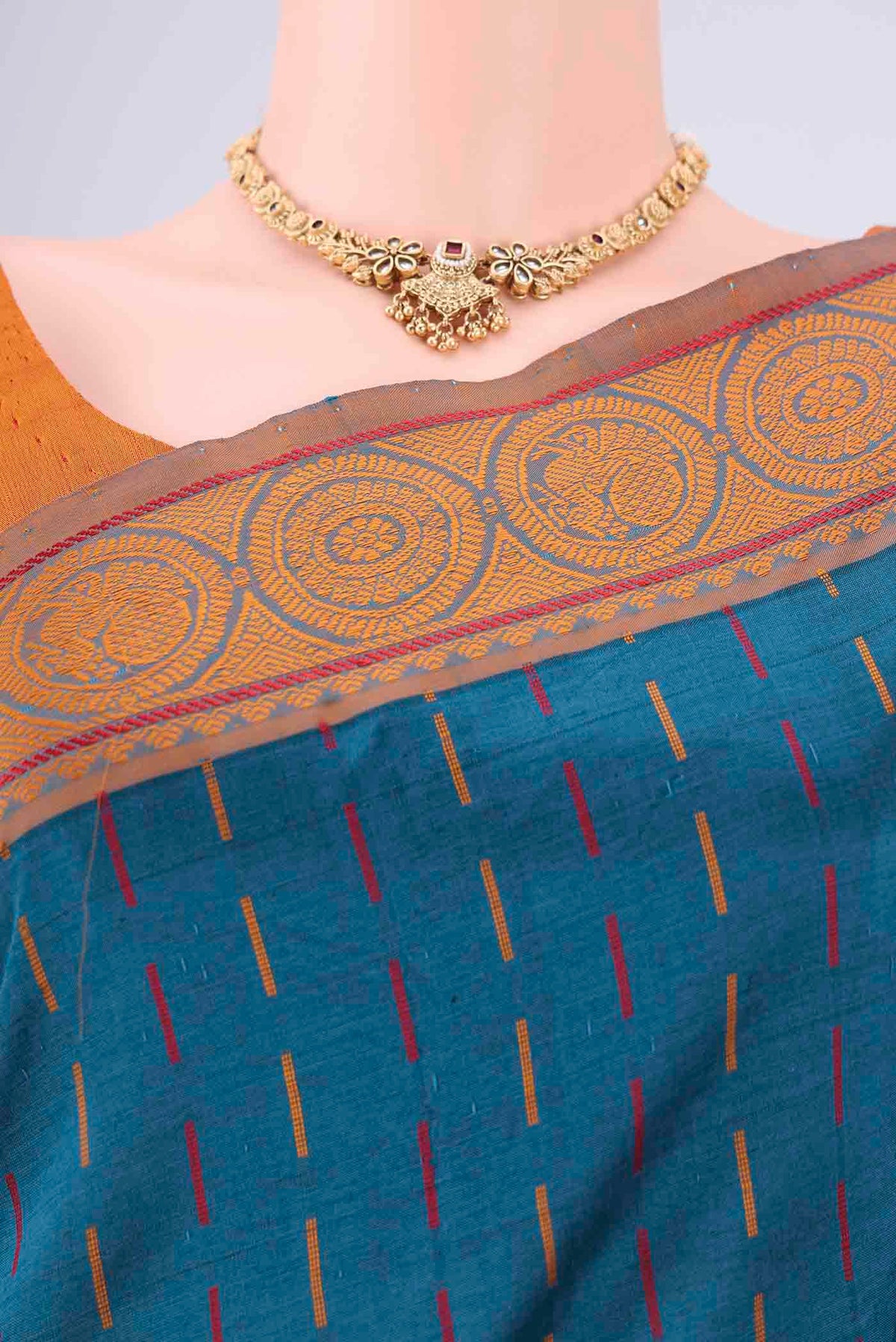 Border image of Blue Blended Poly Cotton Saree with Stripes on the body and Thread Border. 