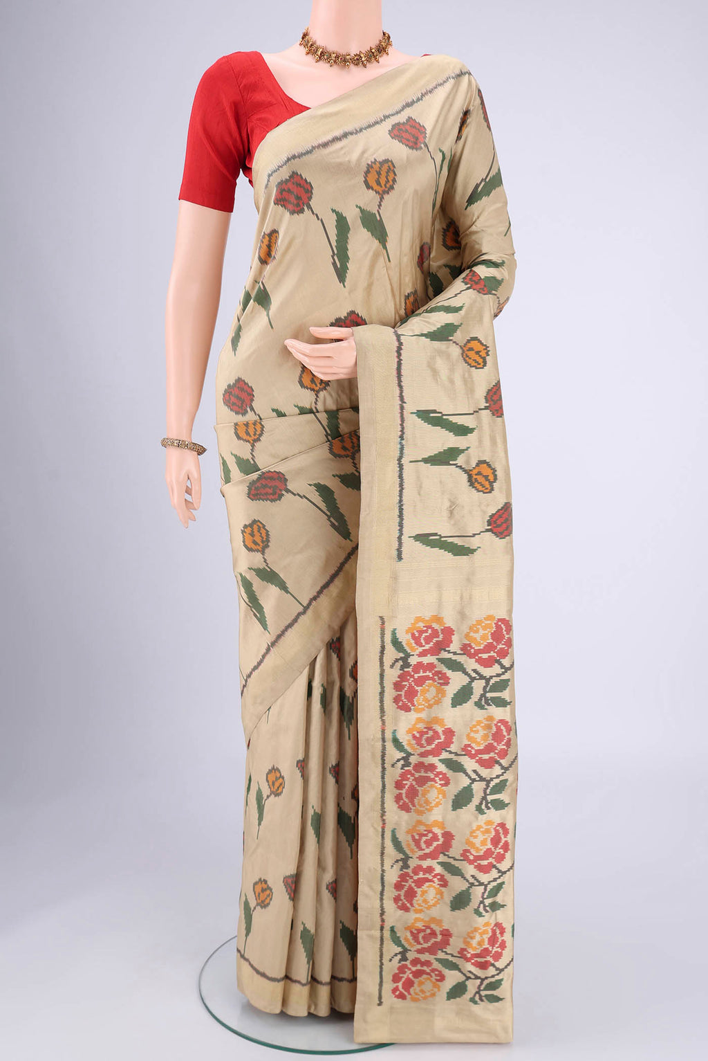 Dark Blue Pochampally Silk Saree with Pure Ikat on the body and Zari Border.  displayed on a mannequin