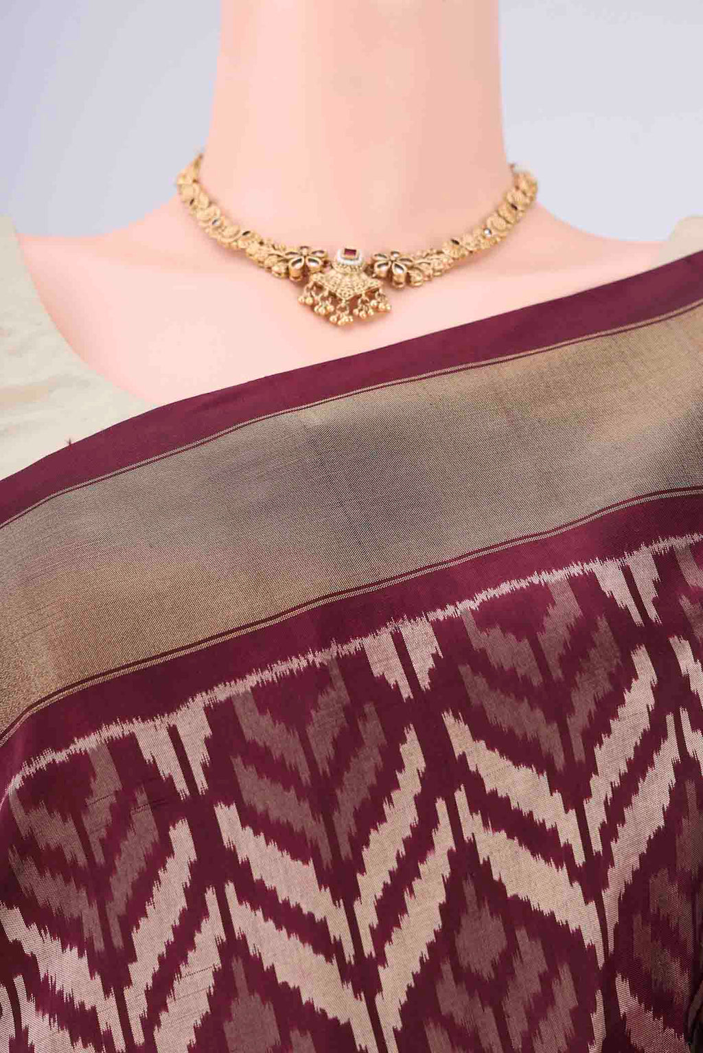 Border image of Coffee Brown Pochampally Silk Saree with Ikat design on the body and Zari Border. 