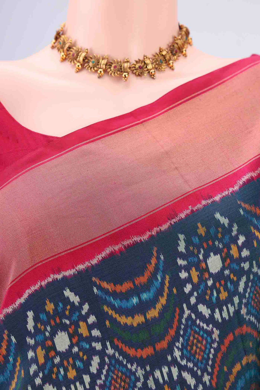 Border image of Peacock Blue Pochampally Silk Saree with Pure Ikat on the body and Zari Border. 