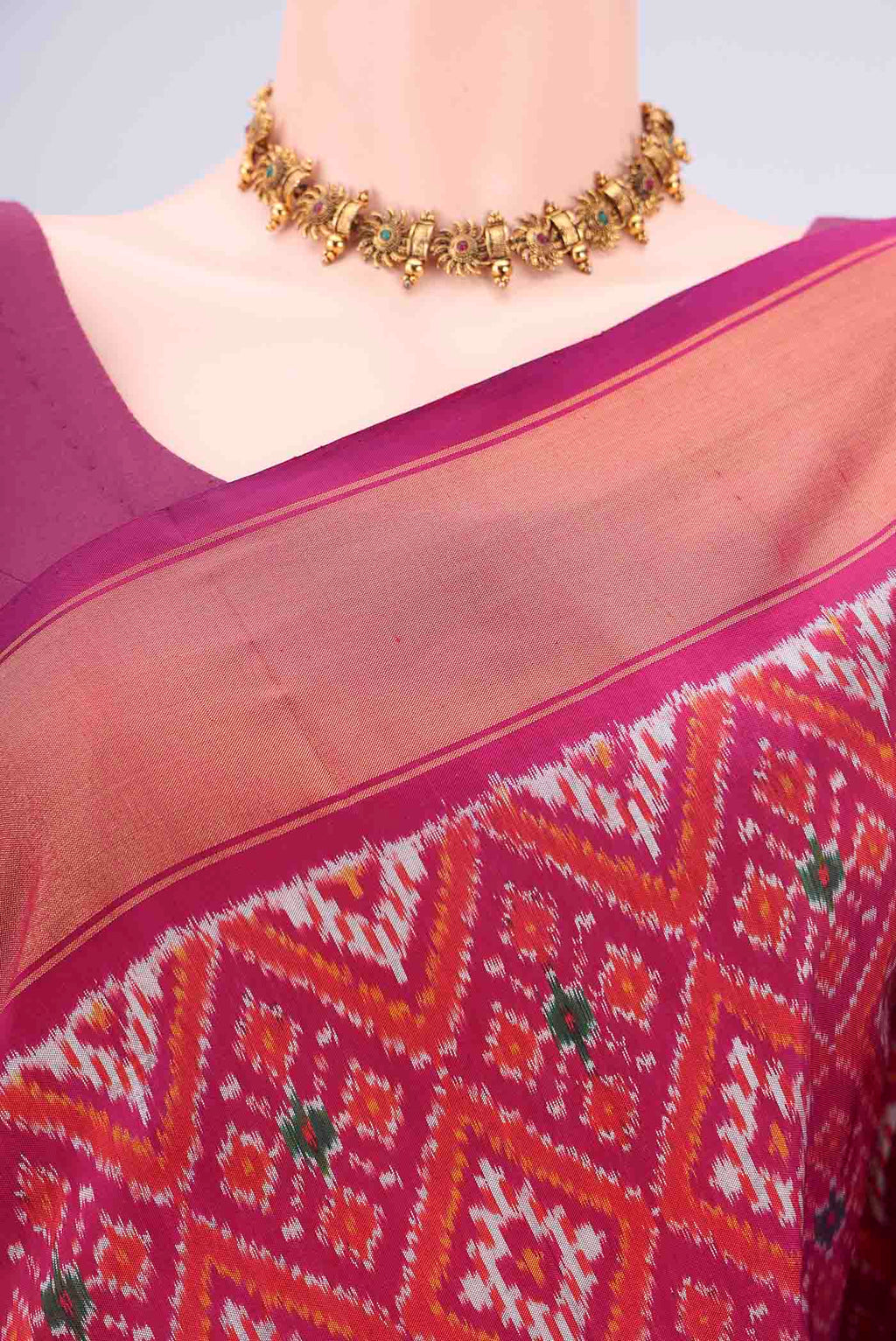 Border image of Magenta Pochampally Silk Saree with Pure Ikat on the body and Zari Border. 