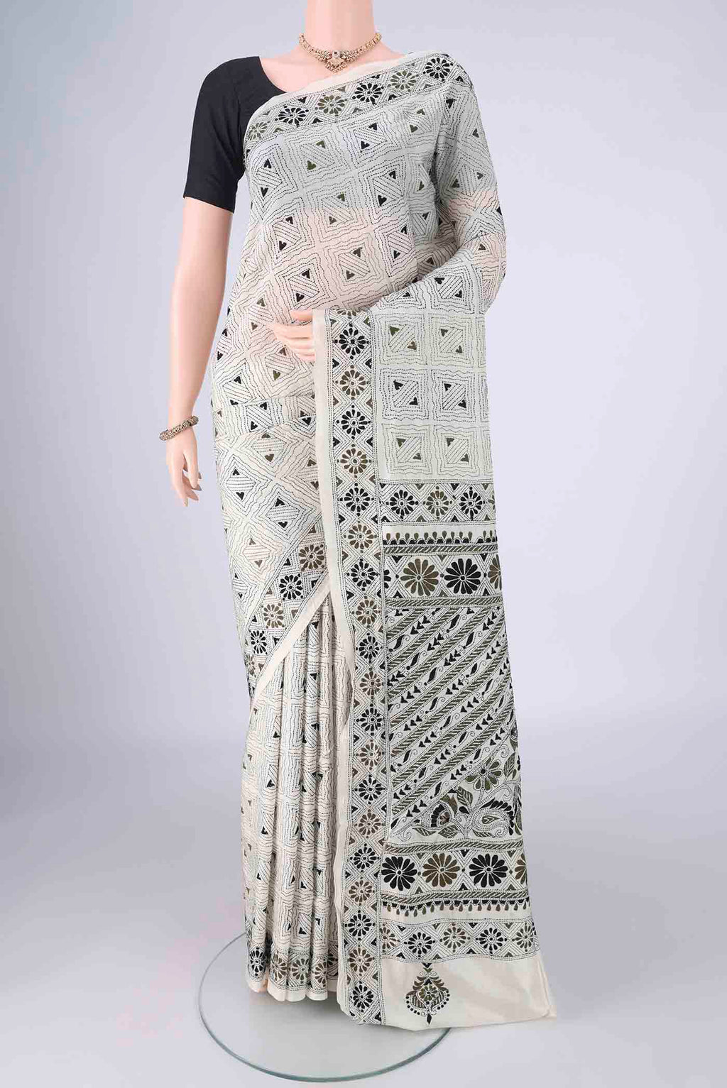 Off White Tussar Silk Saree with Kantha Work on the body and Thread Border.  displayed on a mannequin
