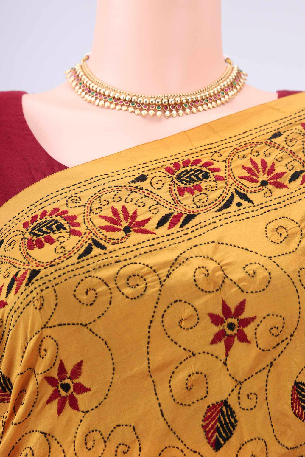 Border image of Mustard Kantha Silk Saree with Kantha Work on the body and Thread Border. 