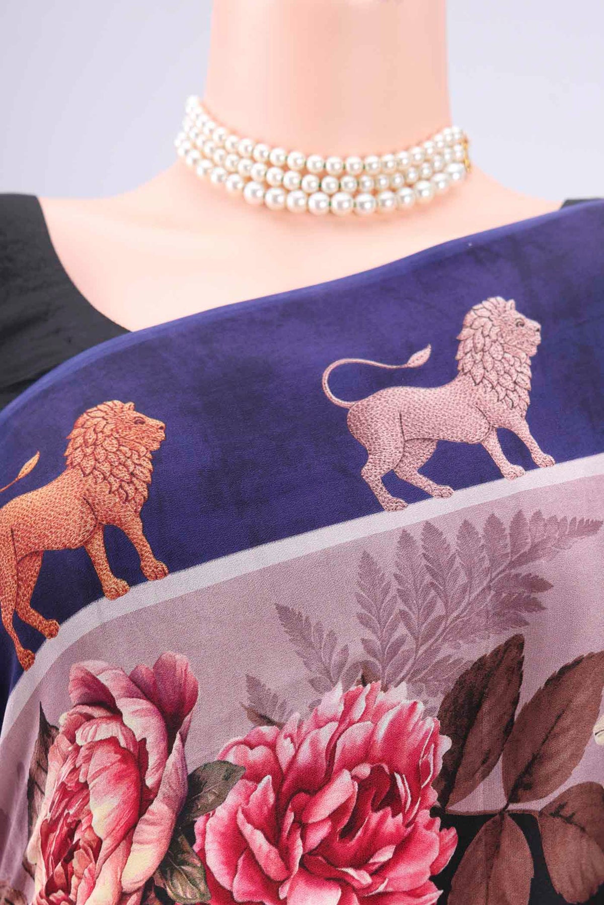 Border image of Black Mysore Crepe Saree with Floral Print on the body and Zari Border. 