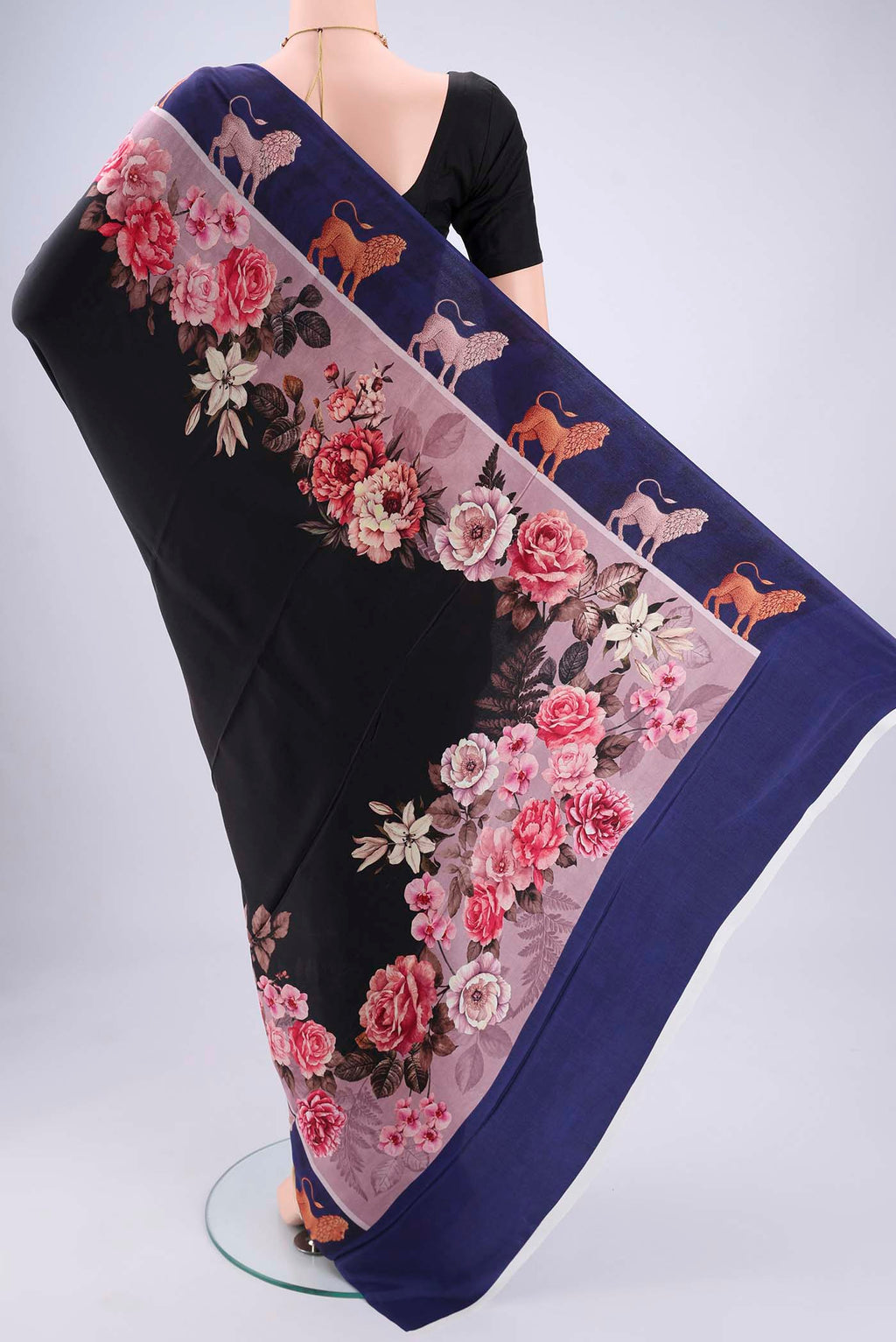 Flat view of Black Mysore Crepe Saree with Floral Print on the body and Zari Border. 