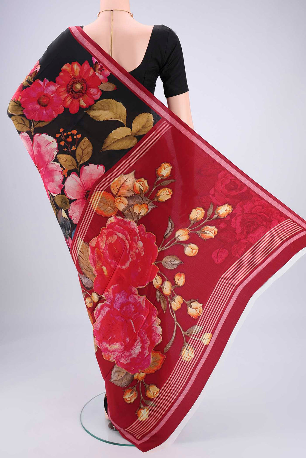 Flat view of Black Mysore Crepe Saree with Floral Print on the body and Zari Border. 
