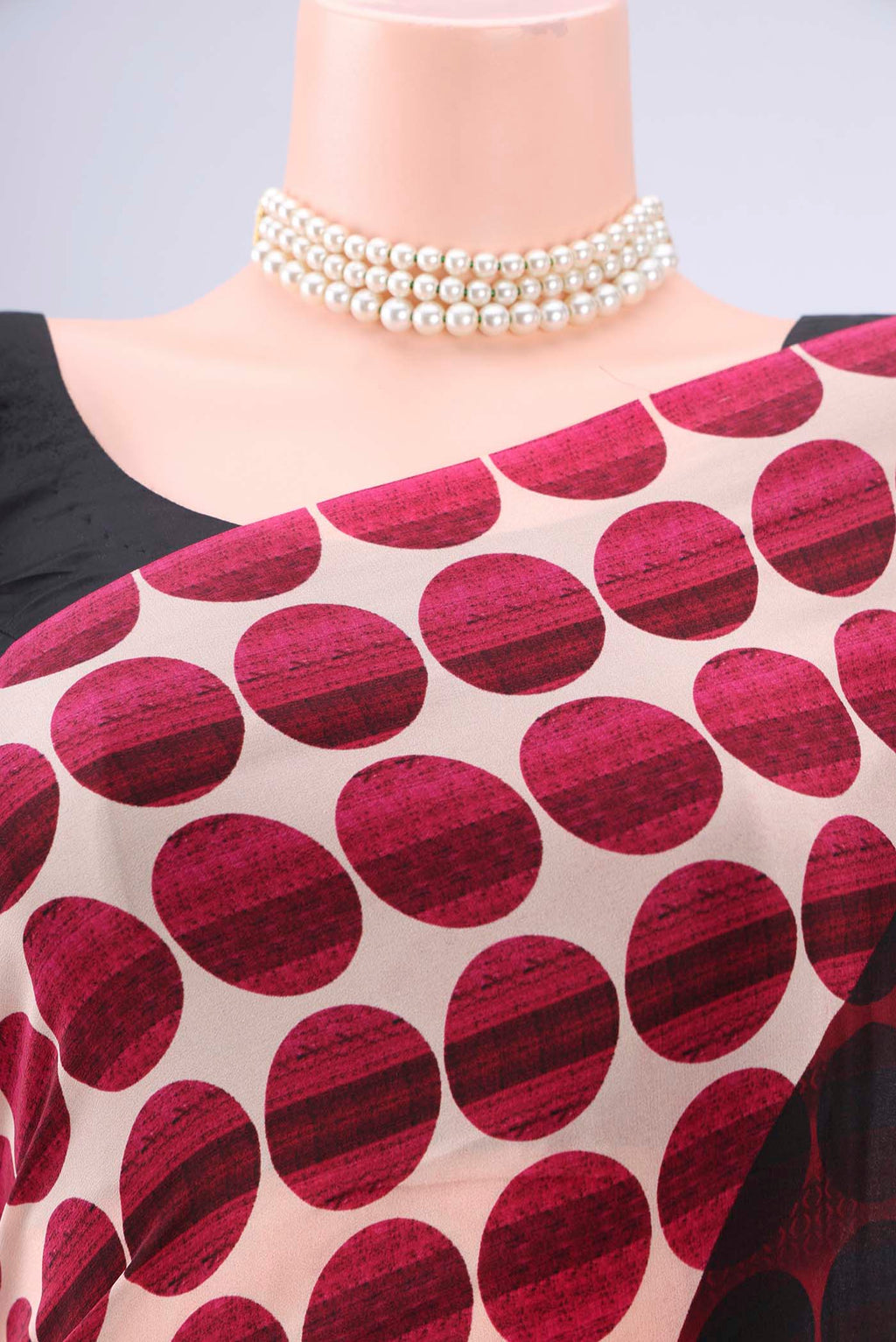 Border image of Black Mysore Crepe Saree with Floral Print on the body and Zari Border. 
