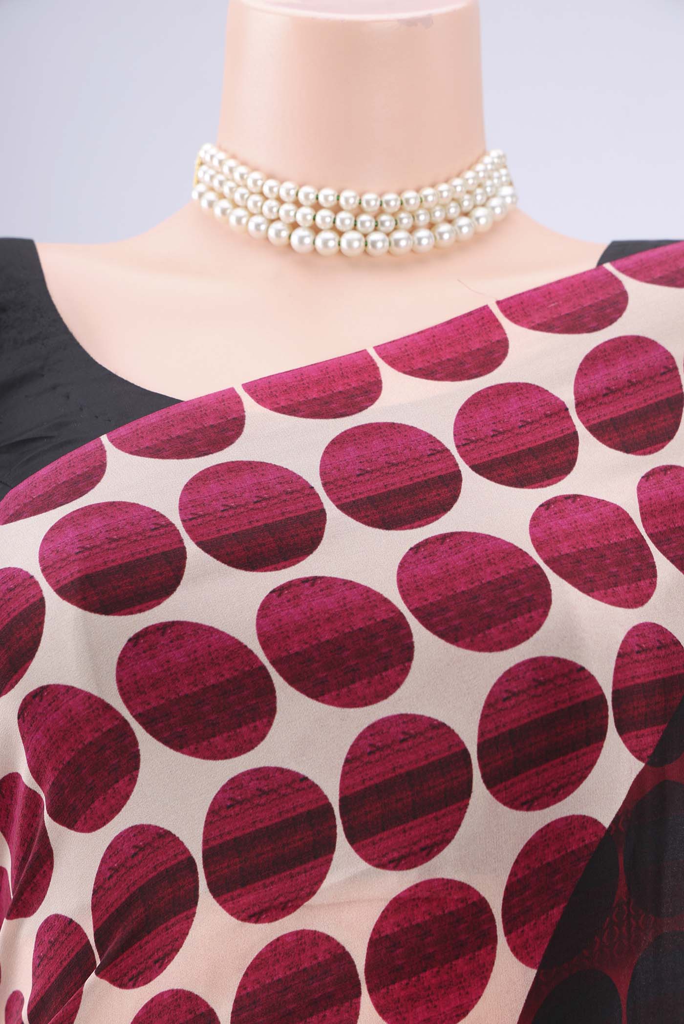 Border image of Black Mysore Crepe Saree with Floral Print on the body and Zari Border. 