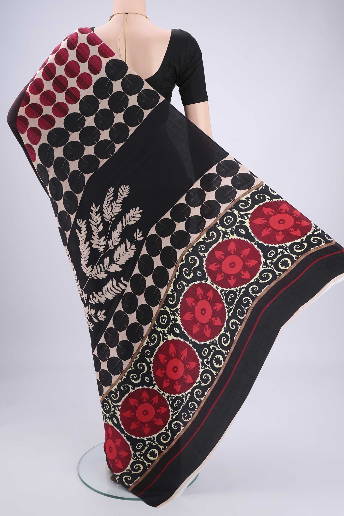 Flat view of Black Mysore Crepe Saree with Floral Print on the body and Zari Border. 