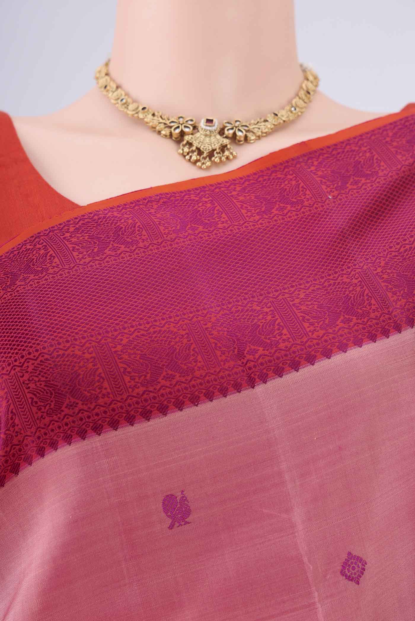 Border image of Rose pink Dual Tone Kanchipuram Saree with Thread Butta on the body and Thread Border. 